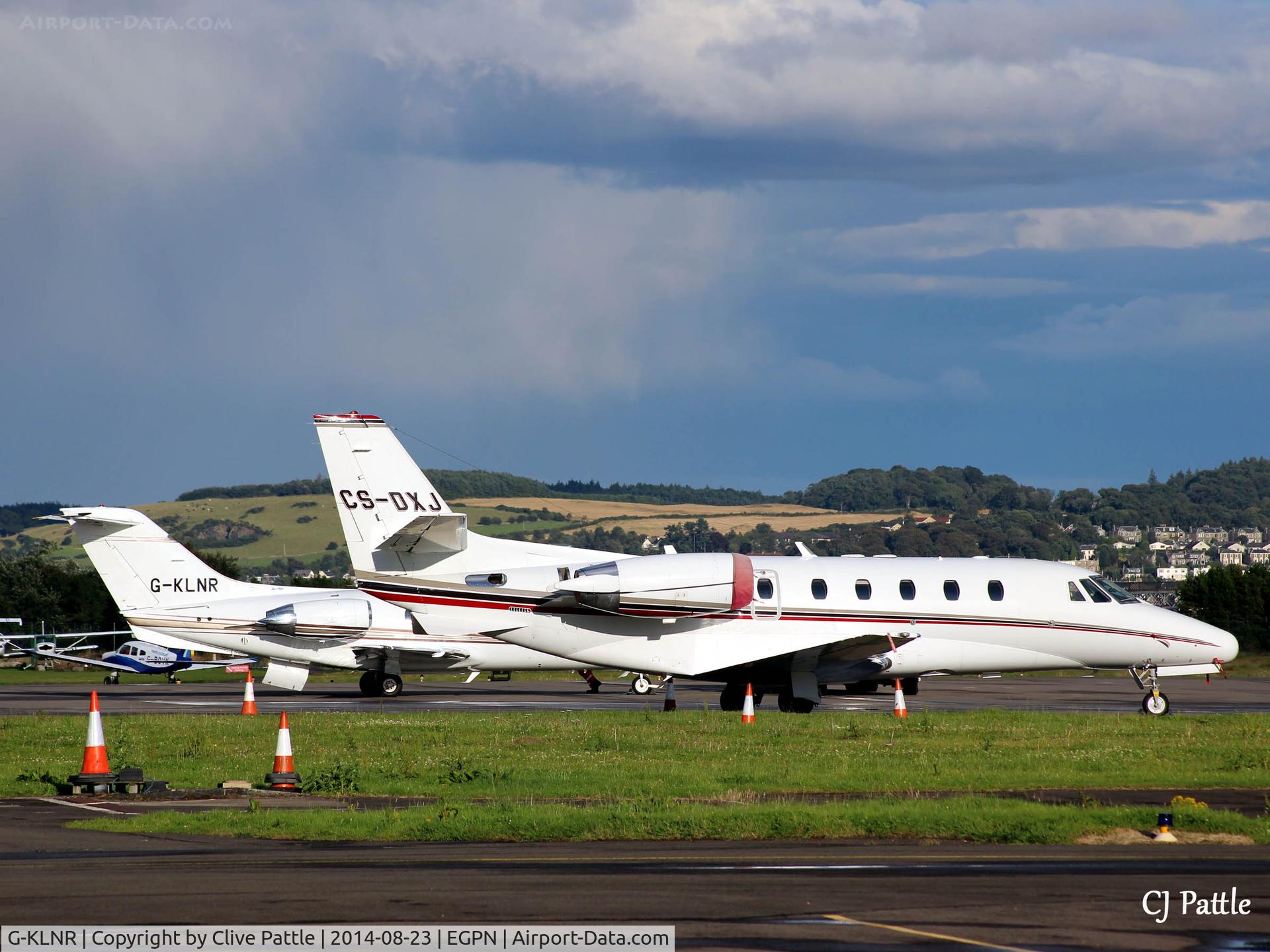 G-KLNR, 2009 Raytheon Hawker 400XP C/N RK-552, KLNR parked on the apron at Dundee Riverside behind fellow visitor CS-DXJ