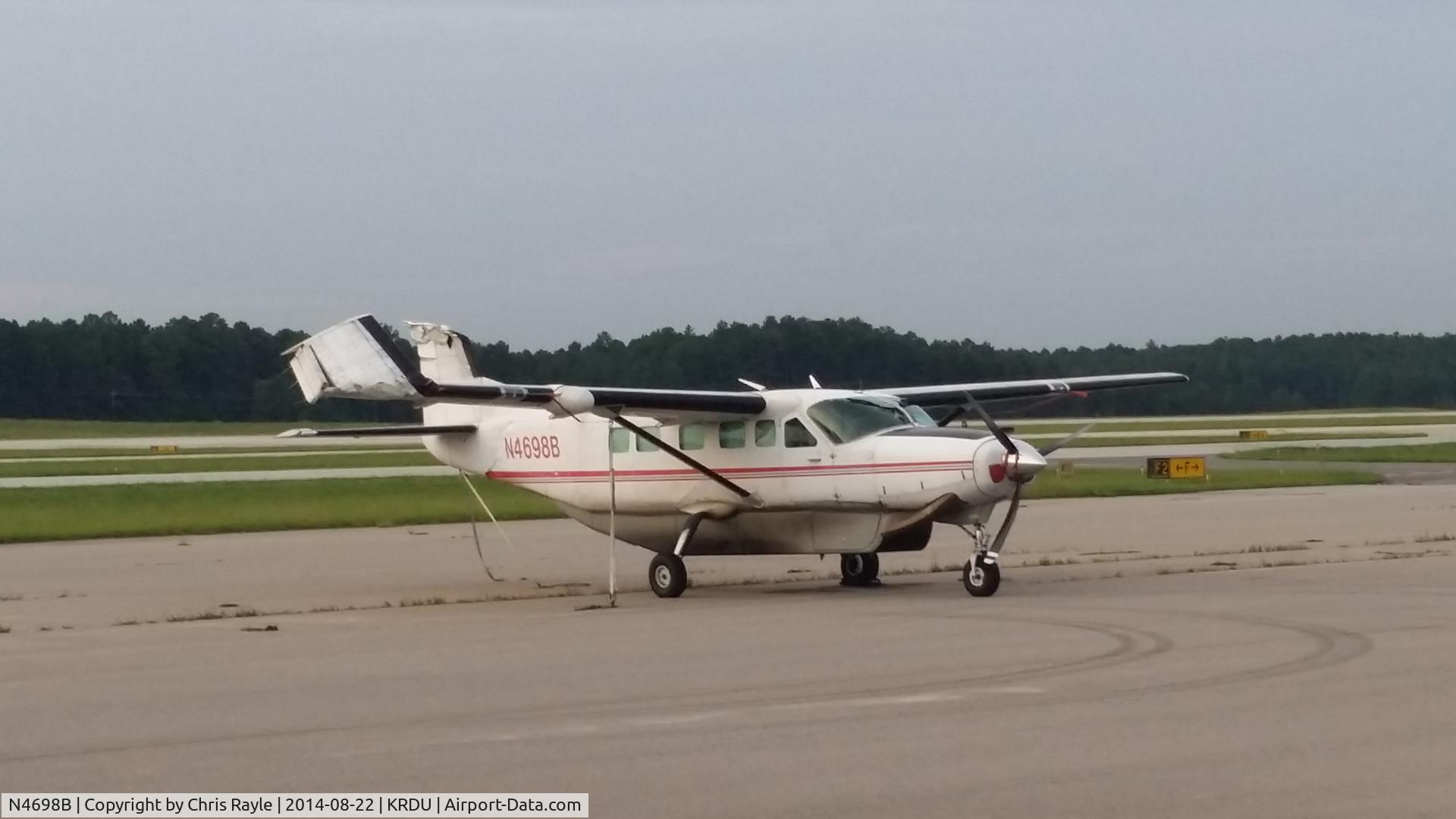 N4698B, 1989 Cessna 208B C/N 208B0175, Oops! Can't find anything on what happened to this caravan, but it appears to have flipped onto its back via right wing. Severe damage to right wing, vertical stab, and both windshields broken. Looks like a write-off. Sad...