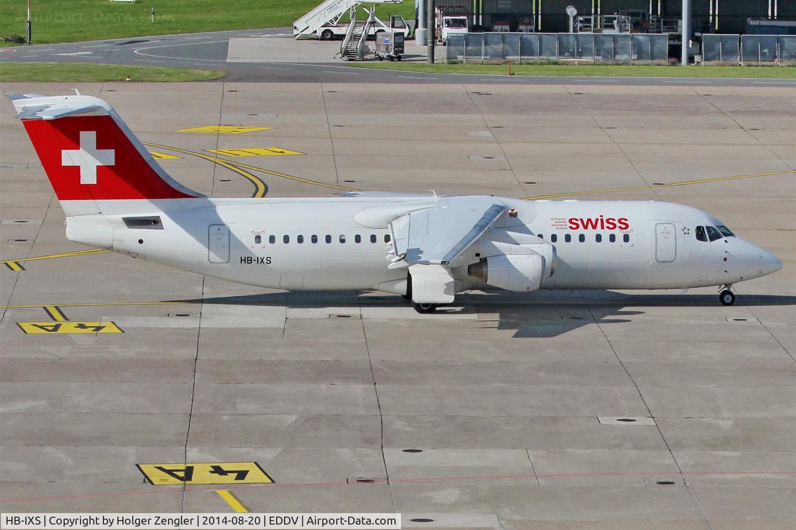 HB-IXS, 1995 British Aerospace Avro 146-RJ100 C/N E3280, On taxi for departure on rwy 27R....
