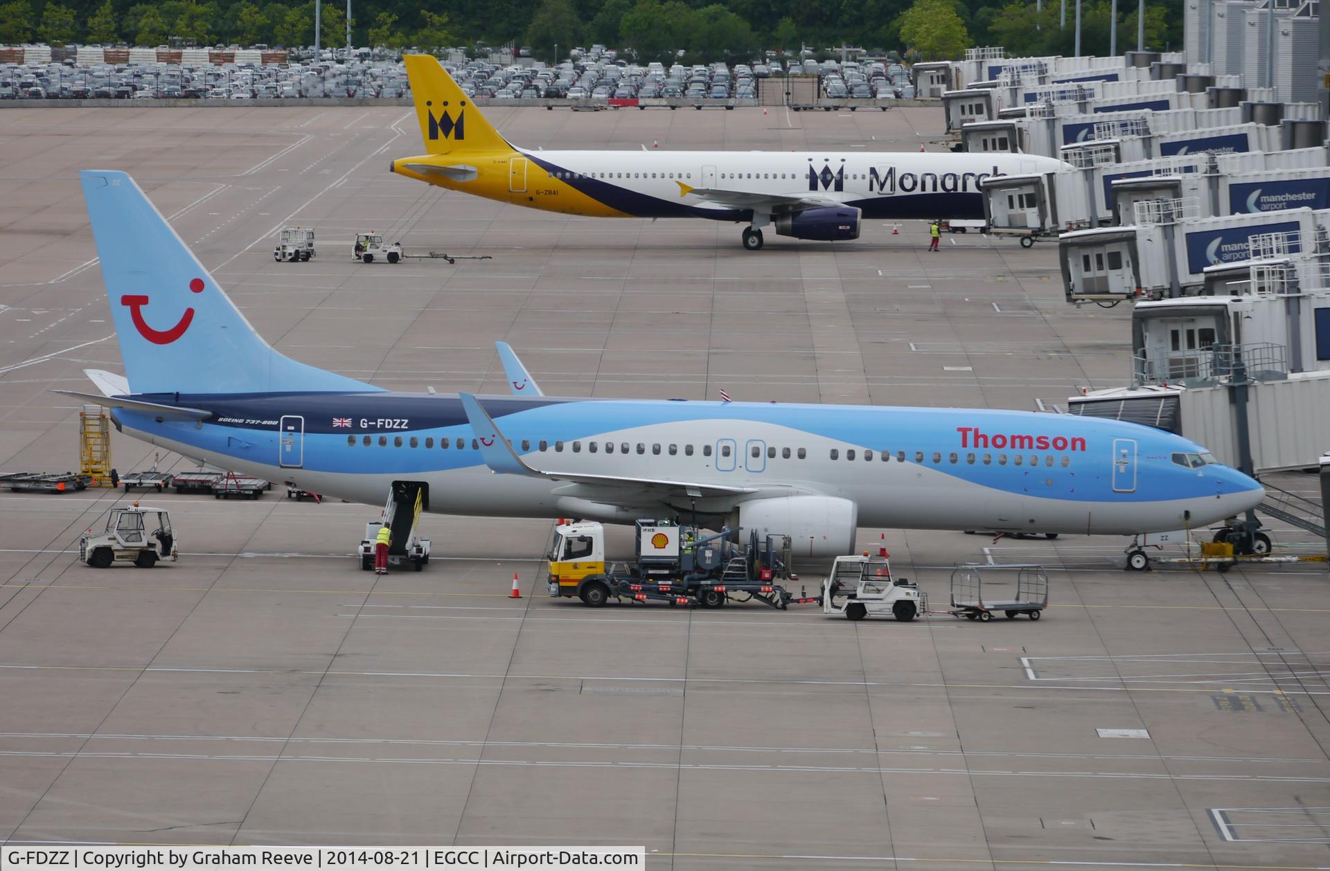 G-FDZZ, 2011 Boeing 737-8K5 C/N 37262, On stand at Manchester.
