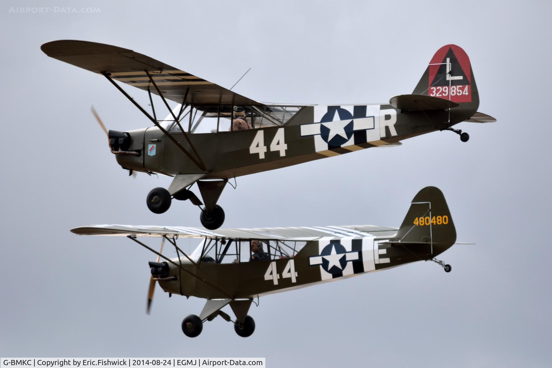 G-BMKC, 1943 Piper L-4H Grasshopper (J3C-65D) C/N 11145, 45. G-BMKC in good company (The 'Normandy Bears') at a superb Little Gransden Air & Car Show, Aug. 2014.