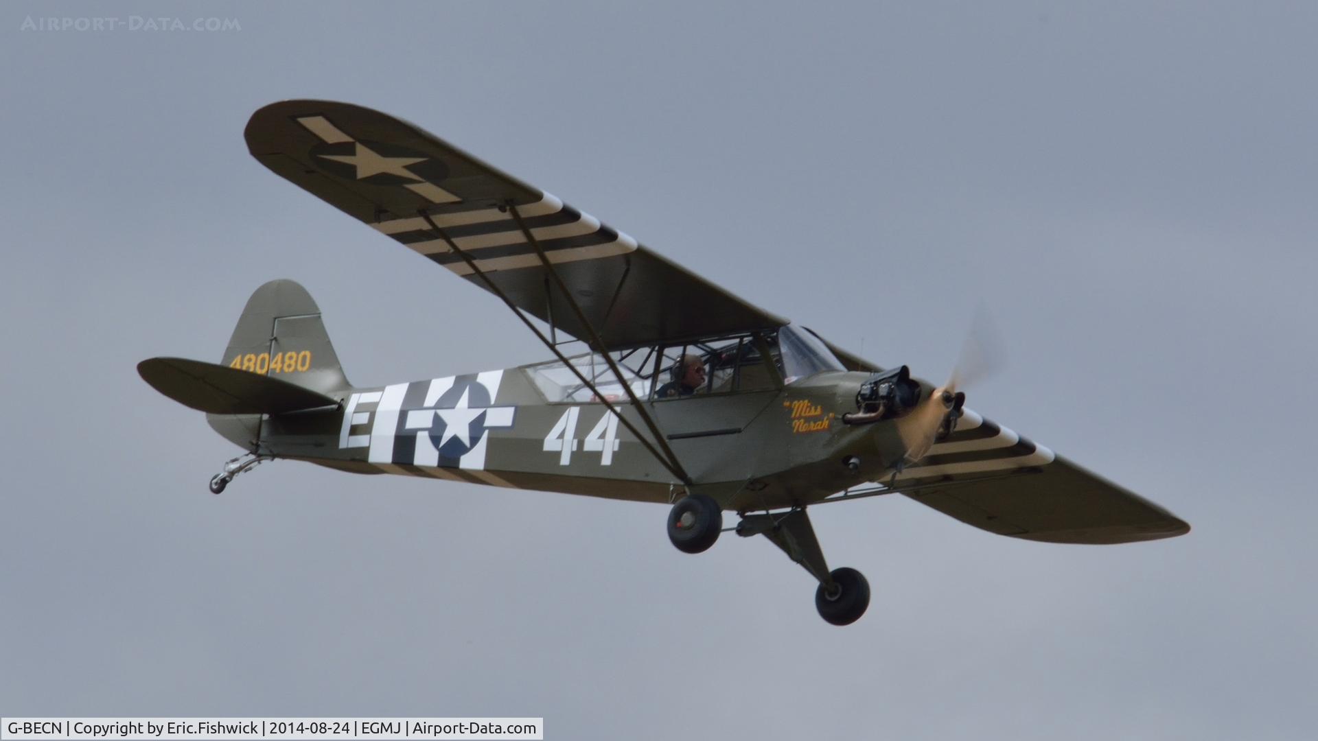 G-BECN, 1944 Piper L-4J Grasshopper (J3C-65D) C/N 12776, 43. 44-80480 ('Miss Norah') in display mode at a superb Little Gransden Air & Car Show, Aug. 2014.