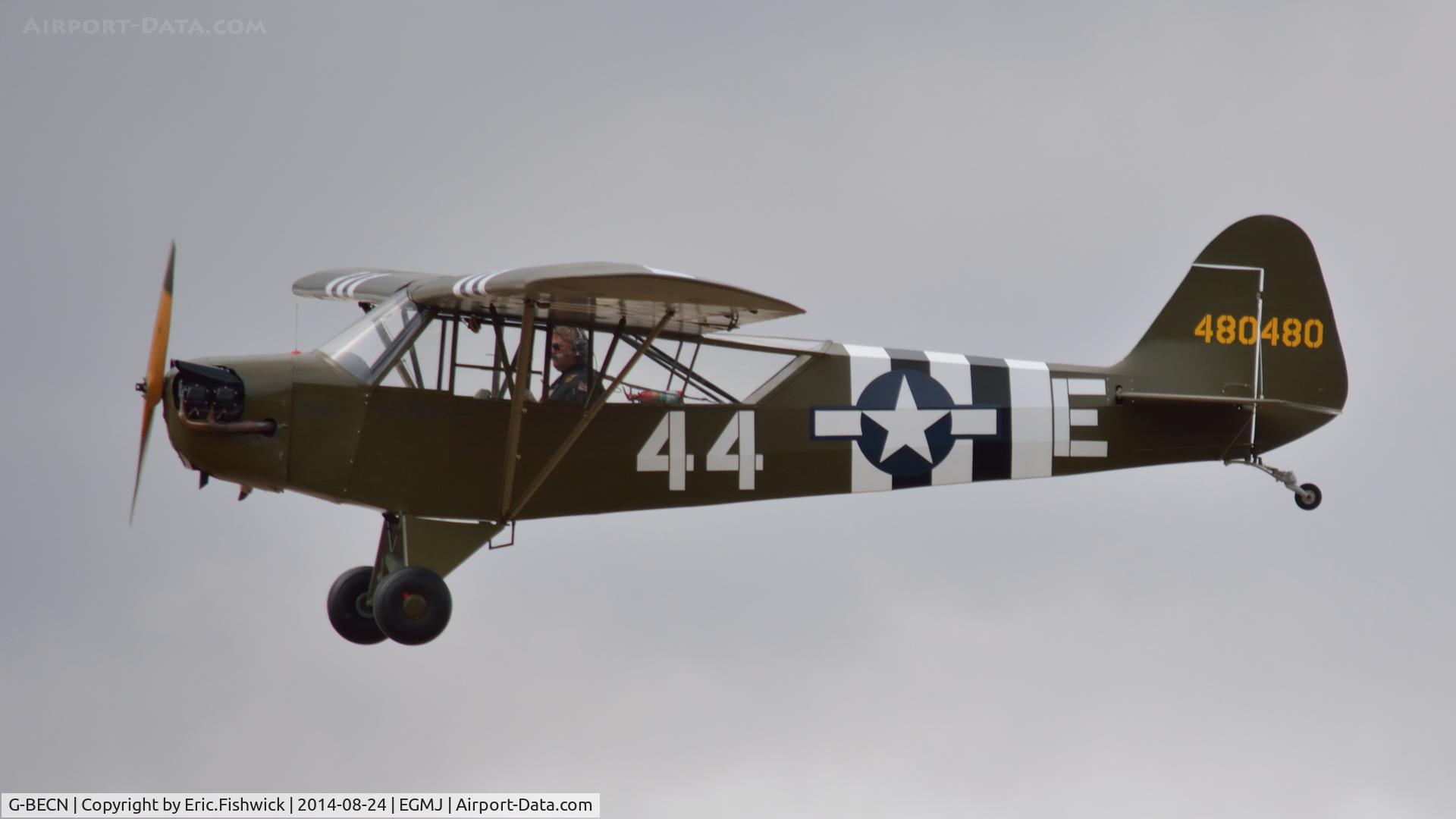 G-BECN, 1944 Piper L-4J Grasshopper (J3C-65D) C/N 12776, 41. 44-80480 ('Miss Norah') in display mode at a superb Little Gransden Air & Car Show, Aug. 2014.