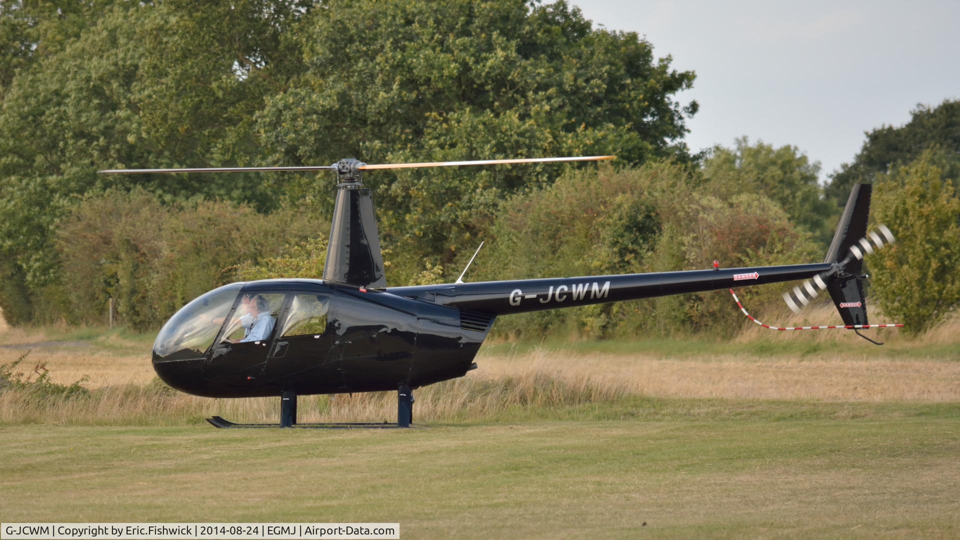 G-JCWM, Robinson R44 II C/N 11860, 1. G-JCWM departing the superb Little Gransden Air & Car Show, Aug. 2014.