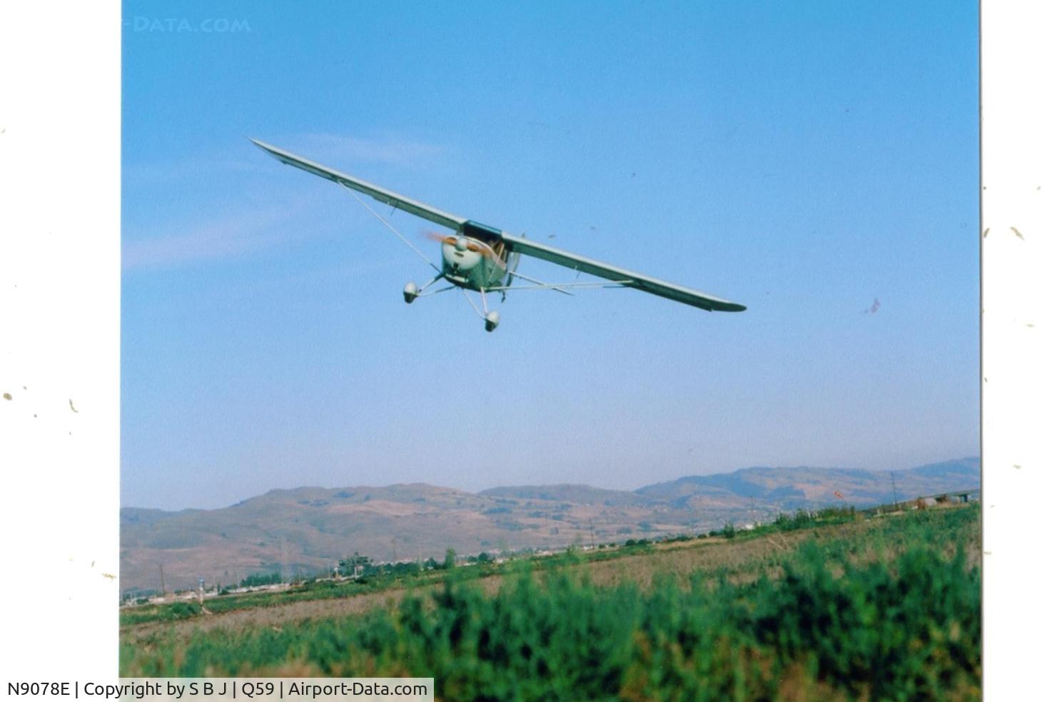 N9078E, 1946 Aeronca 11AC Chief C/N 11AC-710, 78E doing a fly by in 1978.78E spent many hours flying in & around the mts seen in the distance, landing on many dirt runways there-some easy-some not.Fantastic time back then!! I for one sure miss those days.