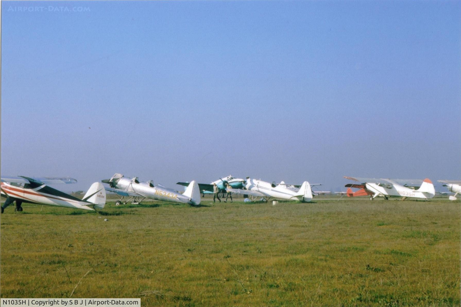 N1035H, 1948 Aeronca 15AC Sedan C/N 15AC-38, 35H seen here (Feb 1964) at the old Livermore airport in Ca.My dad and I were looking at planes as we often did.Very nice back then with such a wide variety of planes as this picture shows. Yes-no security fences so you could actually look at airplanes!!