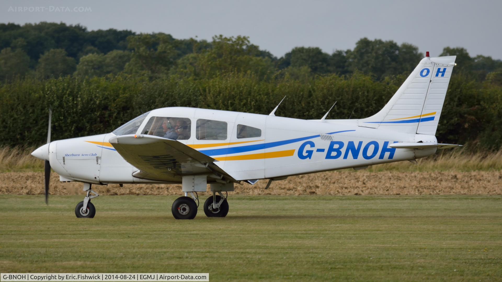 G-BNOH, 1987 Piper PA-28-161 Cherokee Warrior II C/N 2816016, 41. G-BNOH departing the superb Little Gransden Air & Car Show, Aug. 2014.