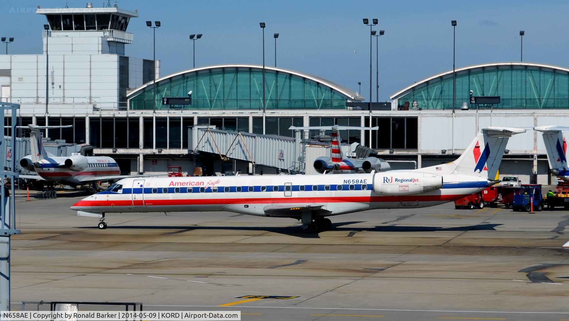 N658AE, 2003 Embraer ERJ-145LR (EMB-145LR) C/N 145760, Taxi O'Hare