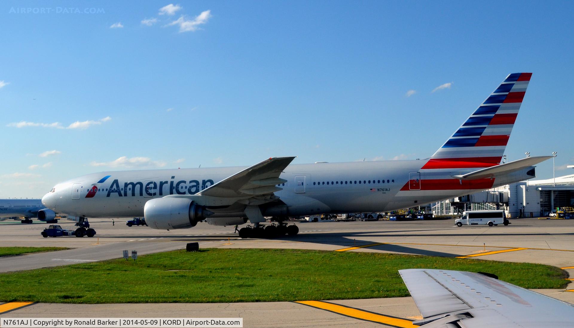 N761AJ, 2002 Boeing 777-223 C/N 31478, Push back O'Hare
