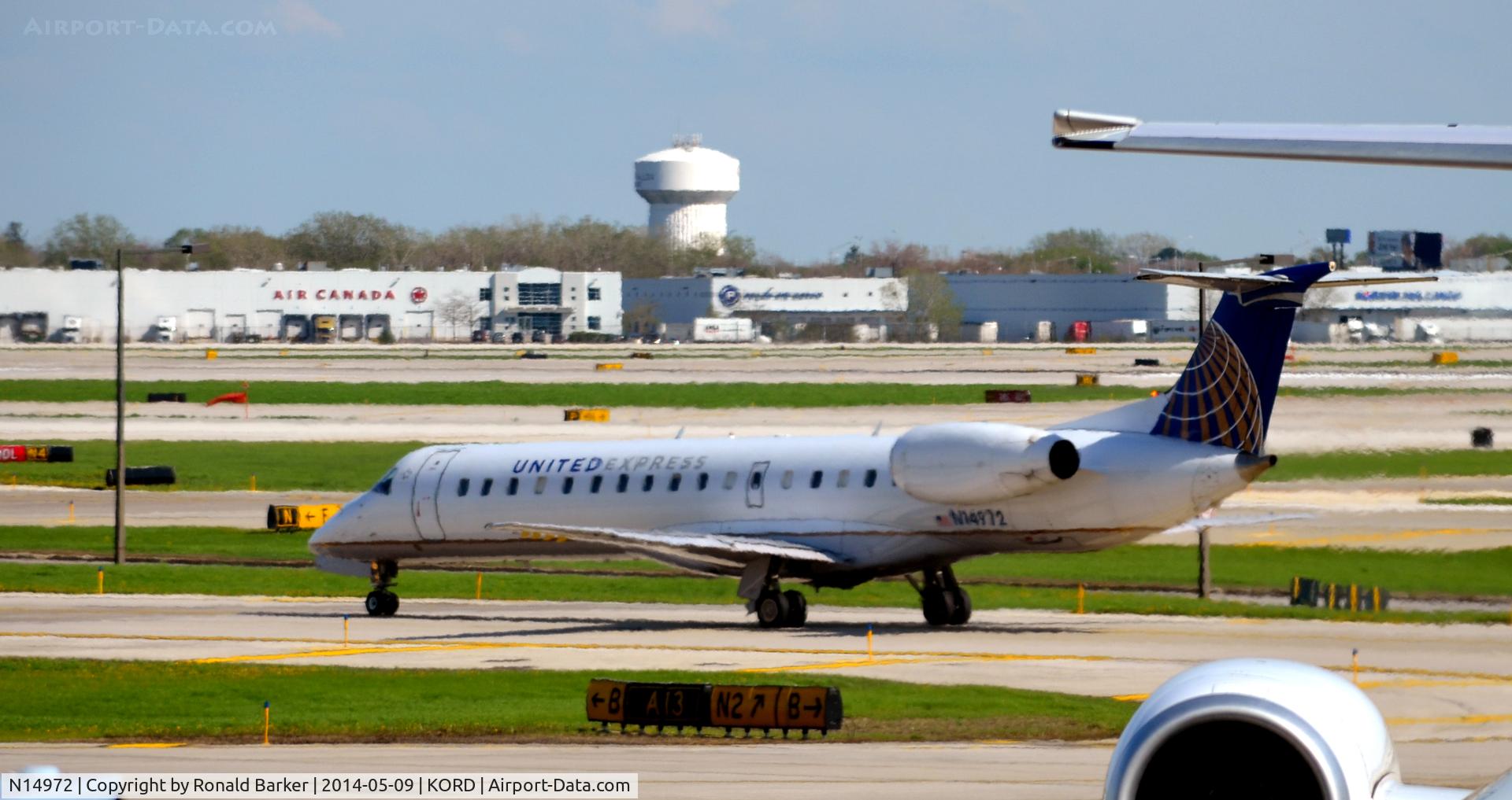 N14972, 1999 Embraer ERJ-145LR (EMB-145LR) C/N 145151, Taxi for takeoff O'Hare