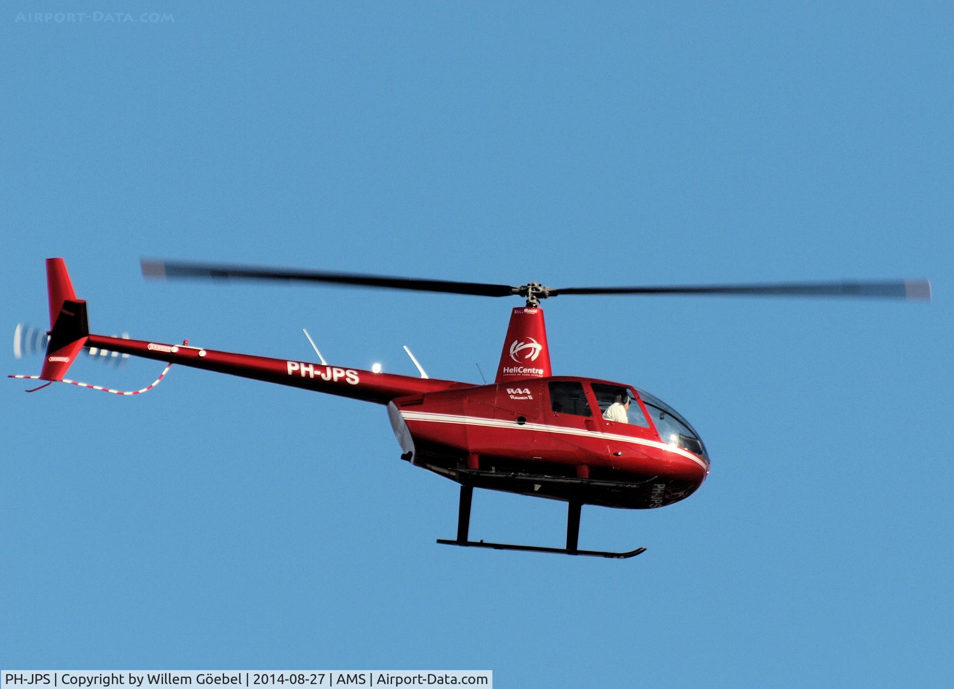 PH-JPS, 2007 Robinson R44 Raven II C/N 11772, Fly over on Schiphol Airport