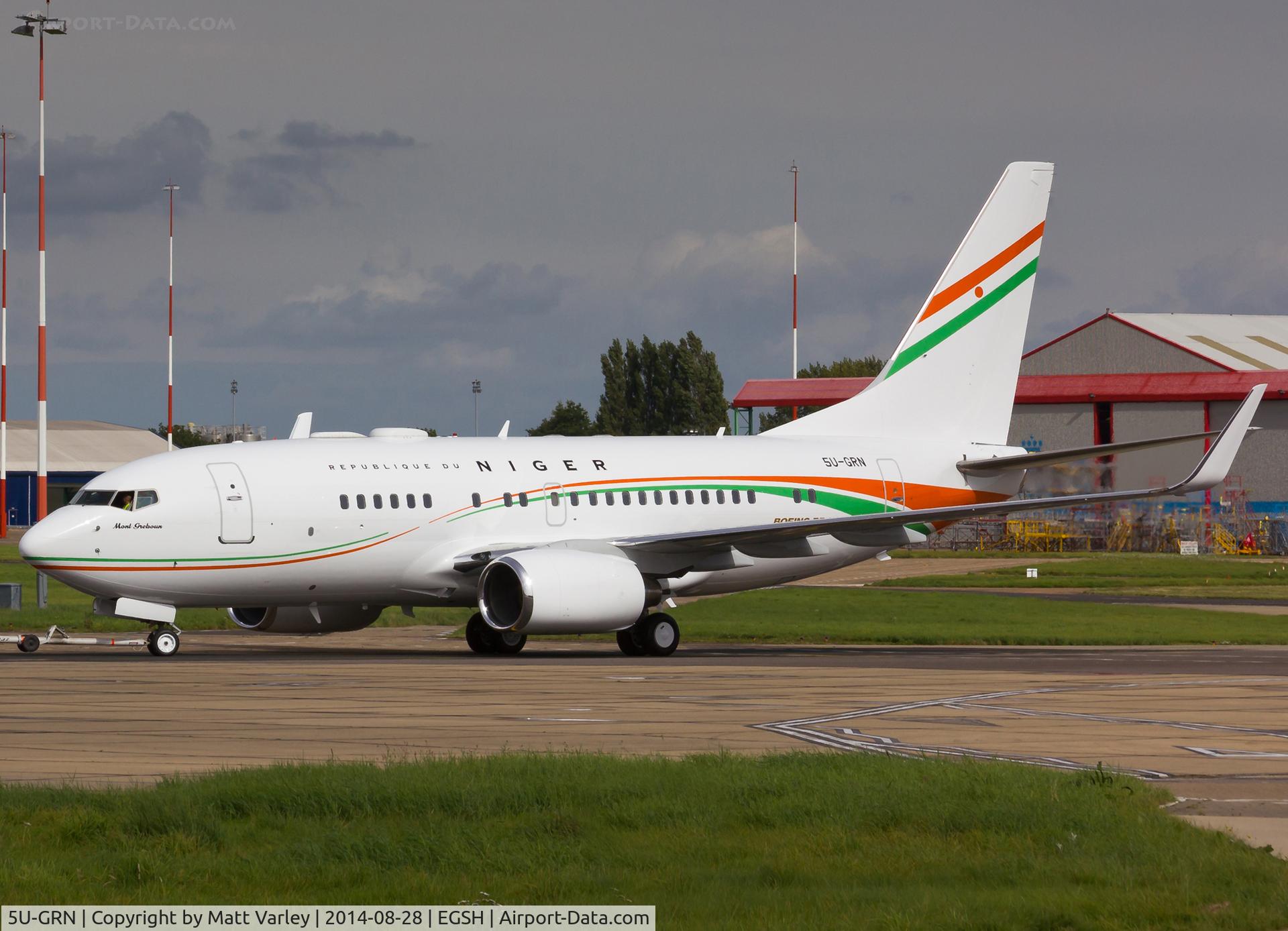 5U-GRN, 1998 Boeing 737-75U C/N 28976, Being pulled to stand....