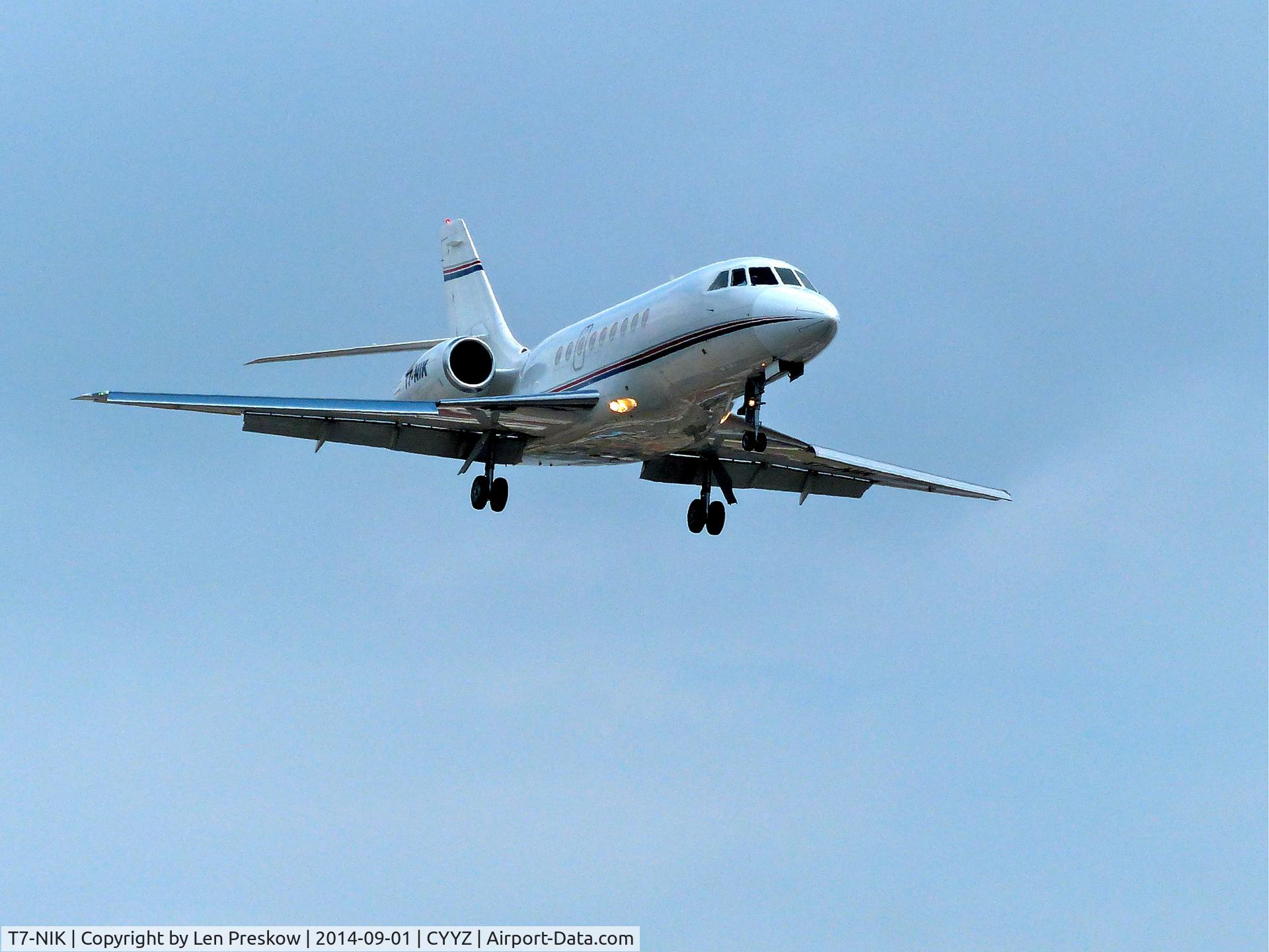 T7-NIK, 1996 Dassault Falcon 2000 C/N 025, Dassault Falcon 2000, T7-NIK, built n 1996 and registered to a private owner in San Marino. Short finals, runway 23, Lester B. Pearson International Airport, Toronto (YYZ).
