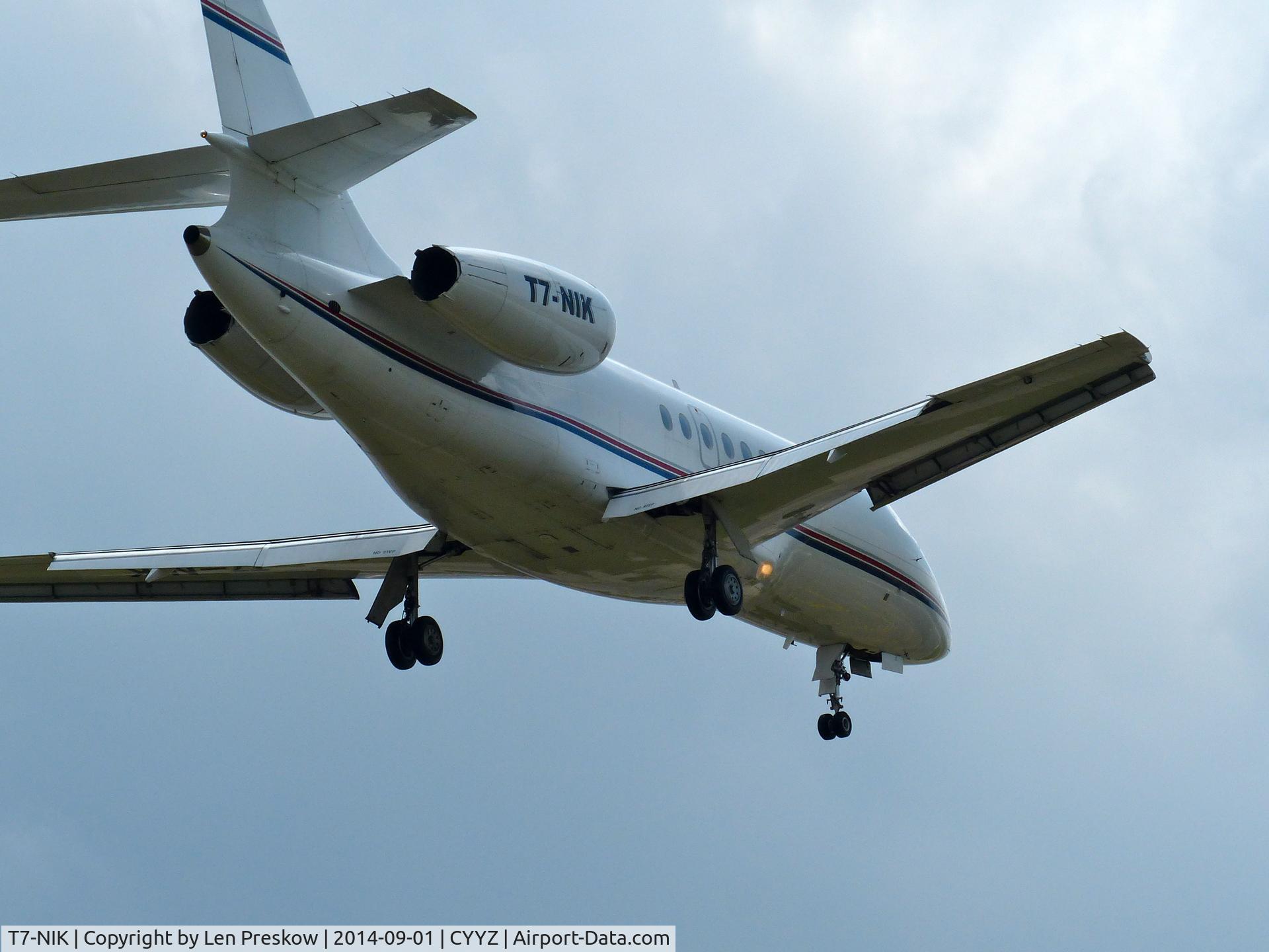 T7-NIK, 1996 Dassault Falcon 2000 C/N 025, Dassault Falcon 2000, T7-NIK, built n 1996 and registered to a private owner in San Marino. Short finals, runway 23, Lester B. Pearson International Airport, Toronto (YYZ).