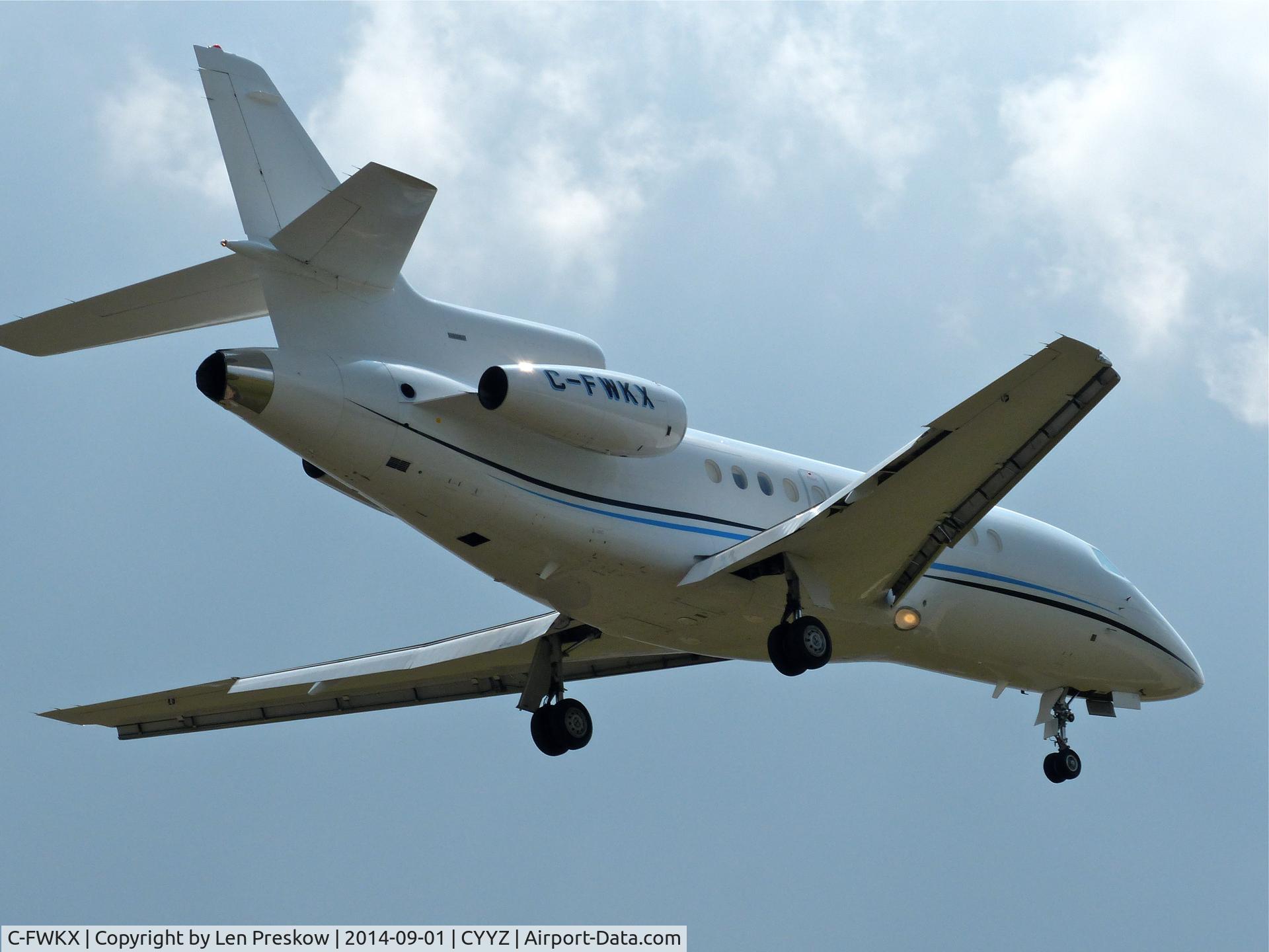C-FWKX, 1993 Dassault Falcon 900B C/N 120, Dassault Falcon 900B, C-FWKX, built n 1993 and registered to Image Air Charter, Mississauga, Canada. Short finals, runway 23, Lester B. Pearson International Airport, Toronto (YYZ).