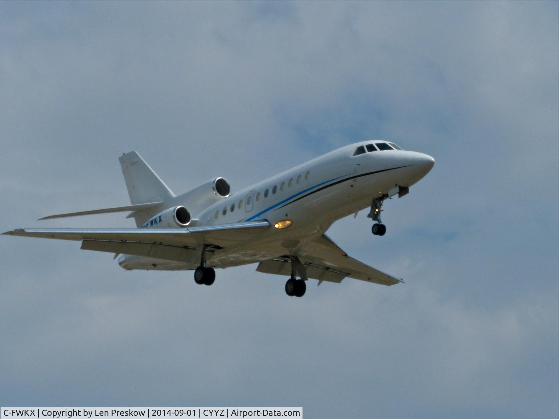 C-FWKX, 1993 Dassault Falcon 900B C/N 120, Dassault Falcon 900B, C-FWKX, built n 1993 and registered to Image Air Charter, Mississauga, Canada. Short finals, runway 23, Lester B. Pearson International Airport, Toronto (YYZ).