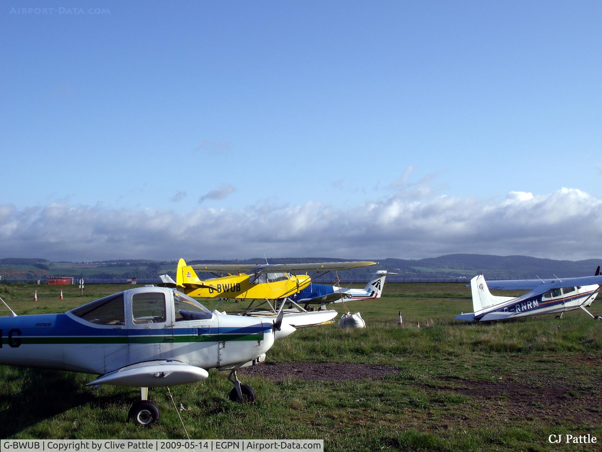 G-BWUB, 1954 Piper L-21B Super Cub C/N 18-3986, G-BWUB in amongst a varied assortment out to grass at Dundee Riverside EGPN, May 2009