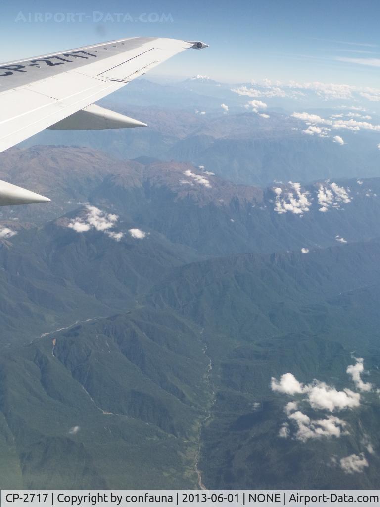 CP-2717, 1990 Boeing 737-53A C/N 24788, Eastern slopes of the Andes, from ~1,000 m in the upper Beni River at the bottom of the view, up to 6,000 m high snowy peaks on the horizon, La Paz, Bolivia; regular BOA flight from Cobija to Cochabamba
