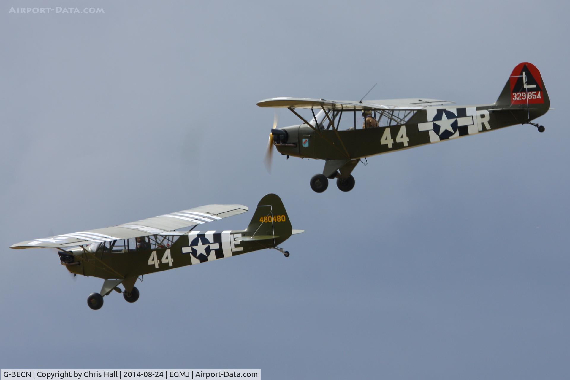 G-BECN, 1944 Piper L-4J Grasshopper (J3C-65D) C/N 12776, in formation with G-BMKC at the Little Gransden Airshow 2014