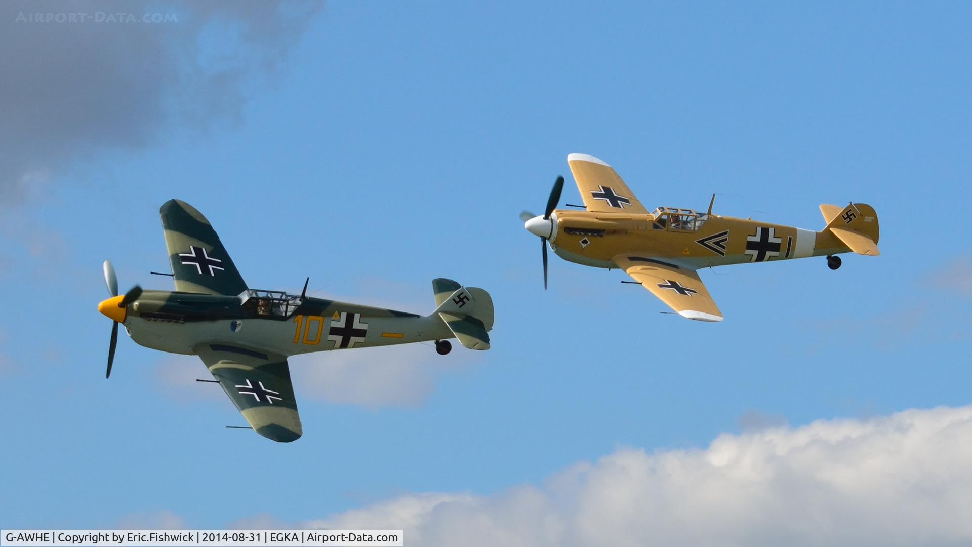 G-AWHE, Hispano HA-1112-M1L Buchon C/N 64, 45. G-AWHE with G-BWUE in display mode at the superb 25th Anniversary RAFA Shoreham Airshow.
