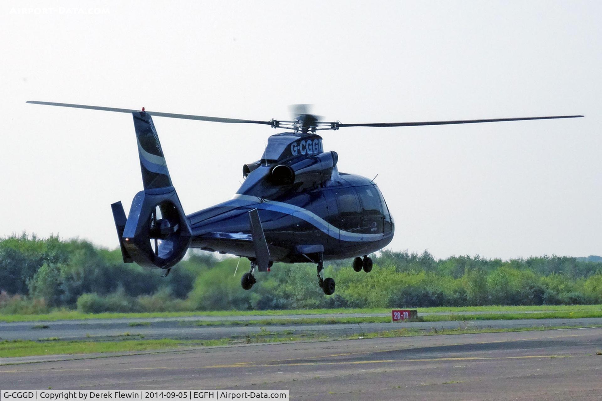G-CGGD, 1991 Aerospatiale AS-365N-2 Dauphin C/N 6435, Dauphin II, seen lifting from the pan at EGFH, shortly after picking up passengers.