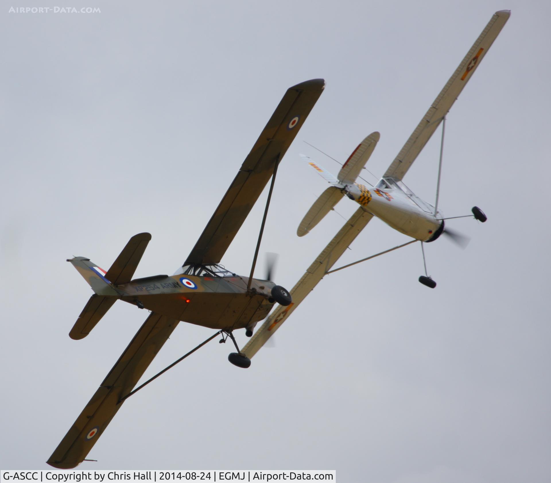 G-ASCC, 1962 Auster AOP.11 C/N B5/10/162, with G-PDOG at the Little Gransden Airshow 2014