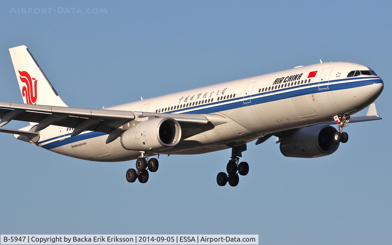 B-5947, 2014 Airbus A330-343 C/N 1538, Short final rwy 19L.