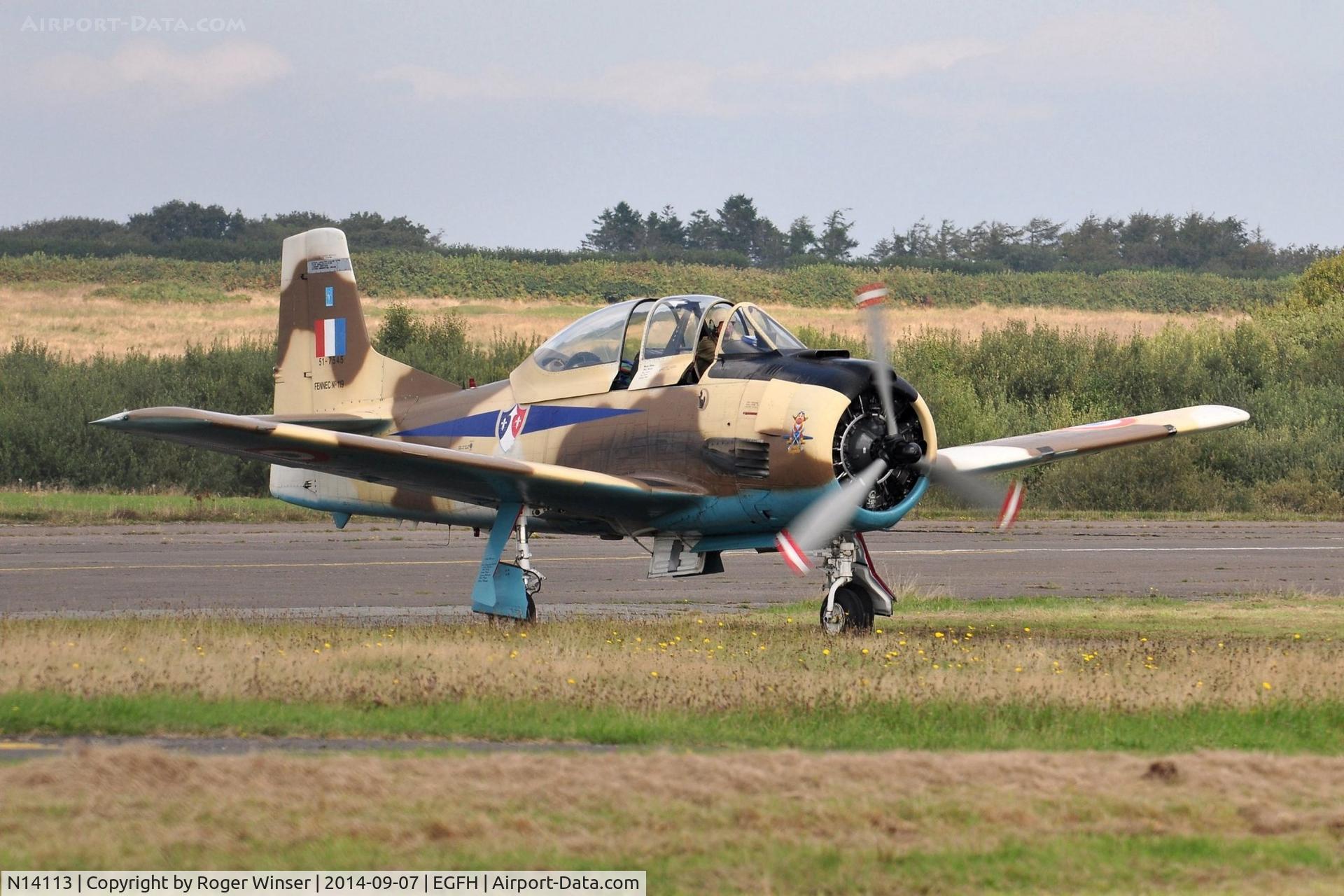 N14113, 1951 North American T-28A Fennec C/N 81-1, Visiting T-28S Fennec in French Air Force markings. Also carries 51-7545, Fennec No 119, c/n 174-398 and FAA s/n 81-1. Built in 1951 as a T-28A the aircraft was 51-7145 in the USAF, Fennec 119 in the French Air Force and 1236 in the Haitian Air Force.