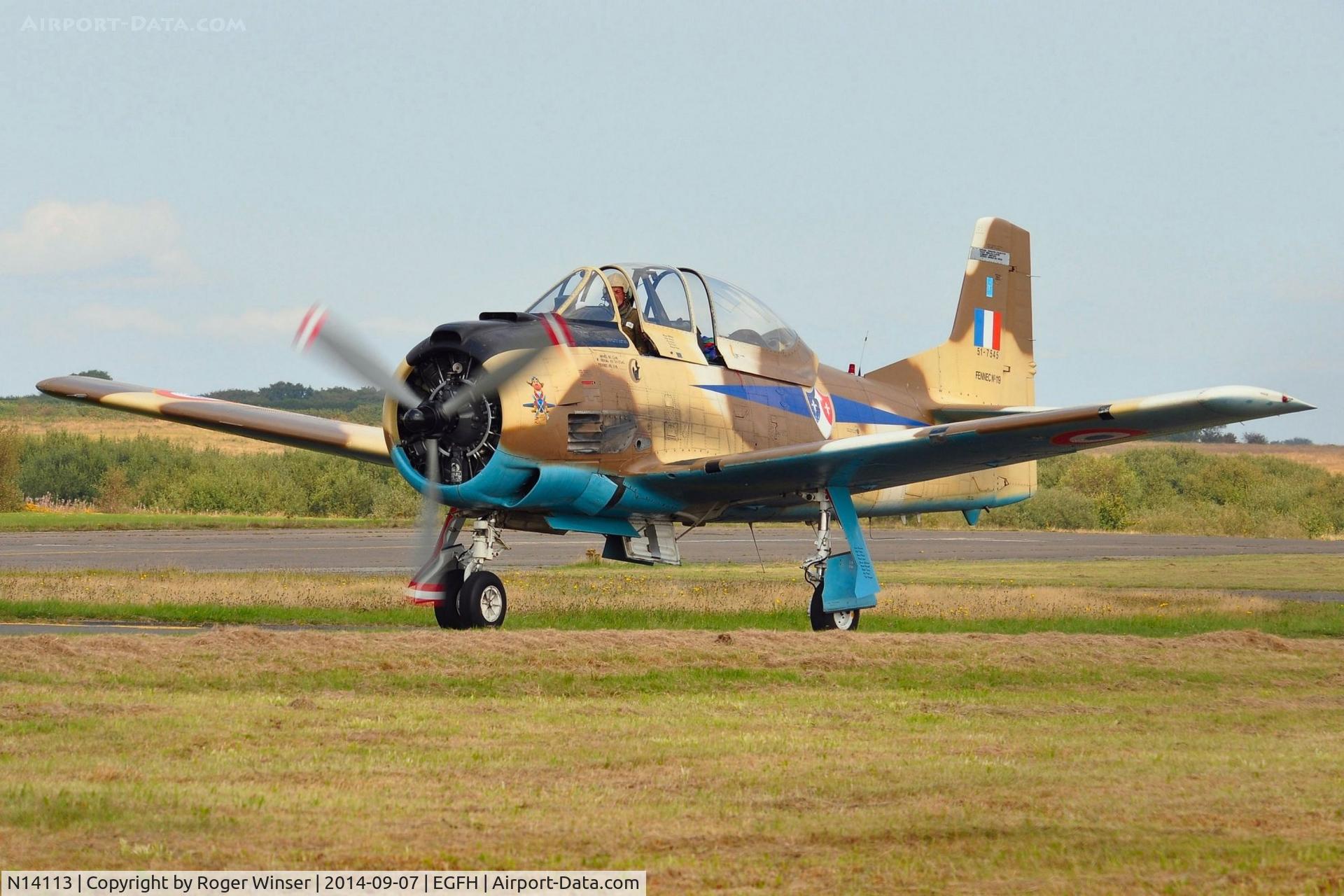 N14113, 1951 North American T-28A Fennec C/N 81-1, Visiting T-28S Fennec in French Air Force markings. Also carries 51-7545, Fennec No 119, c/n 174-398 and FAA s/n 81-1. Built in 1951 as a T-28A, the aircraft was 51-7545 in the USAF, Fennec 119 in the French Air Force and 1236 in the Haitian Air Force.