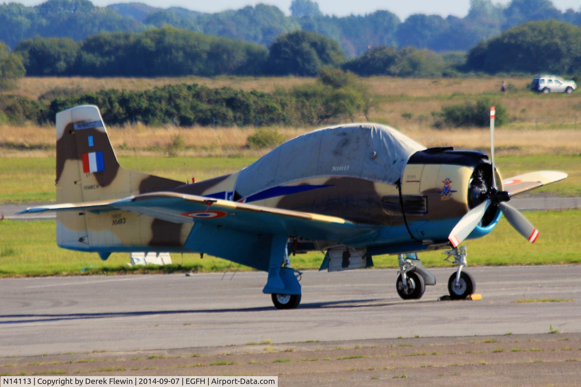 N14113, 1951 North American T-28A Fennec C/N 81-1, Visiting T-28A Fennec, previously, 51-7545, 119, N14113, 1236, Duxford based, displayed in French Air Force marks as, 119 and 51-7545, seen parked up at EGFH.