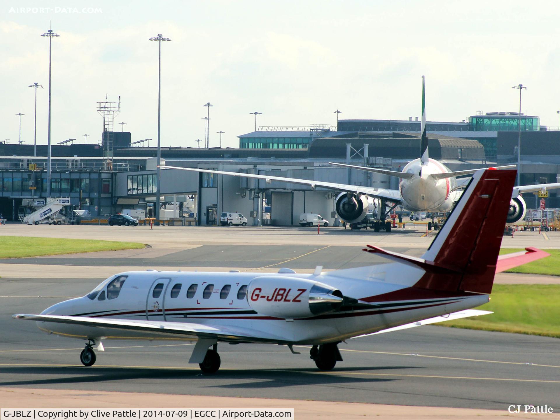 G-JBLZ, 2002 Cessna 550 Citation Bravo C/N 550-1018, Taxy to the Manchester terminal skyline
