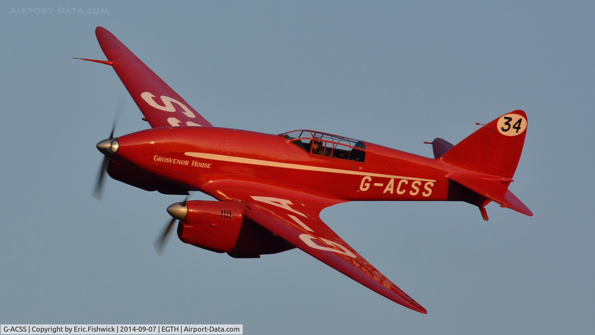 G-ACSS, 1934 De Havilland DH-88 Comet C/N 1996, 43. G-ACSS in display mode at the glorious Shuttleworth Pagent Airshow, Sep. 2014.