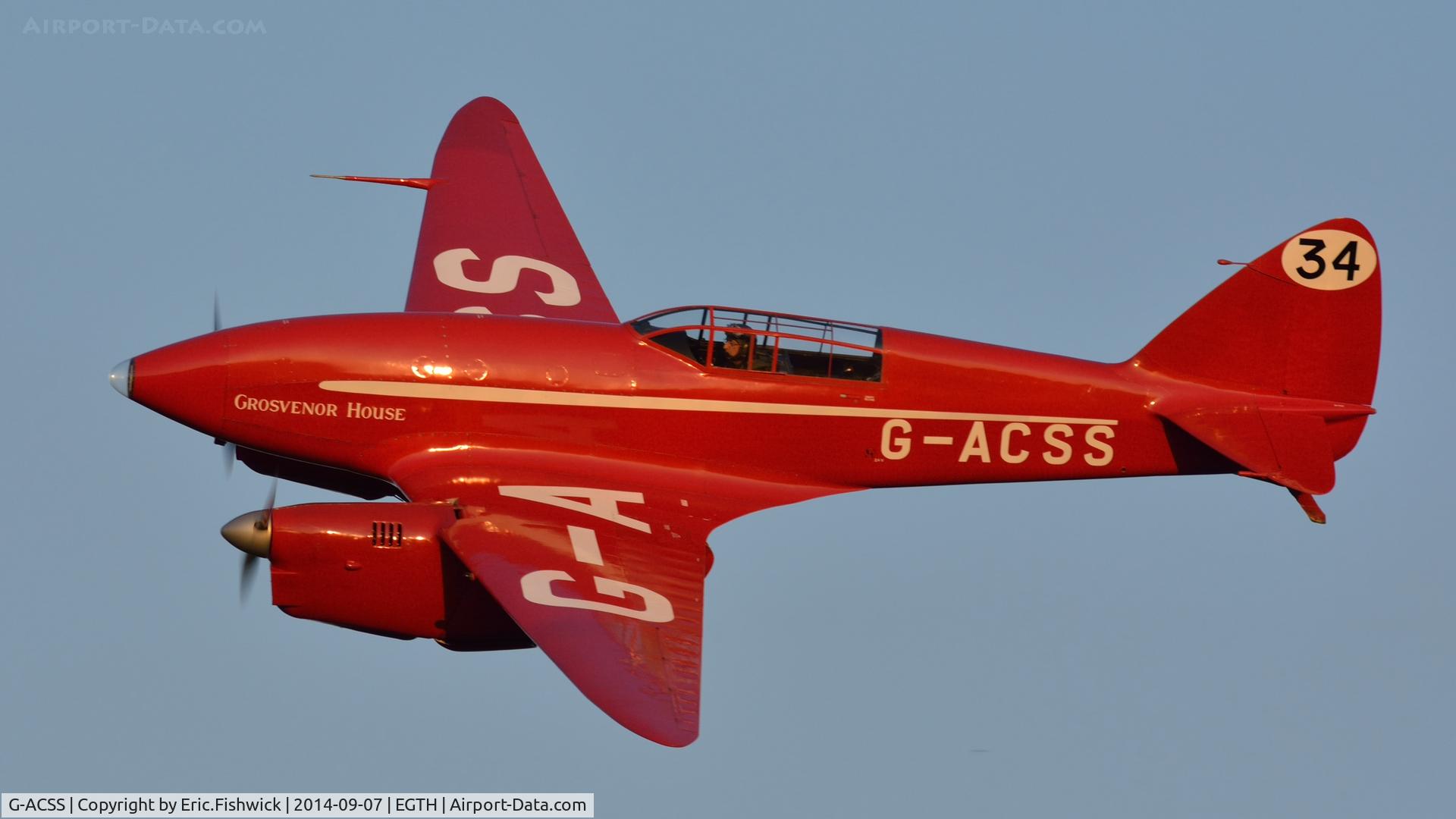 G-ACSS, 1934 De Havilland DH-88 Comet C/N 1996, 41. G-ACSS in display mode at the glorious Shuttleworth Pagent Airshow, Sep. 2014.