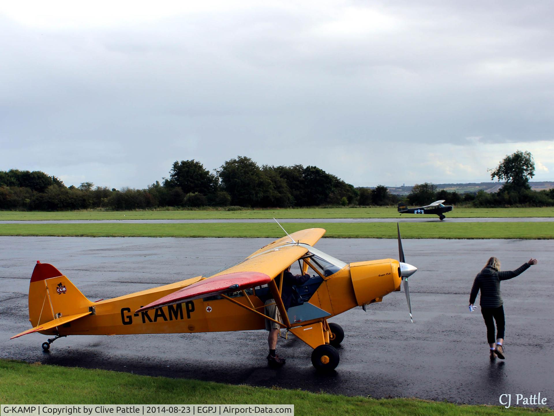 G-KAMP, 1954 Piper L-18C Super Cub (PA-18-95) C/N 18-3451, Wave goodbye to fellow Cub G-BWEZ