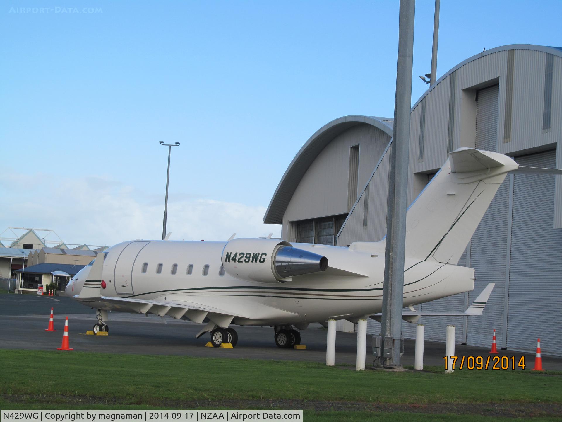 N429WG, 1997 Bombardier Challenger 604 (CL-600-2B16) C/N 5341, On convair apron at AKL