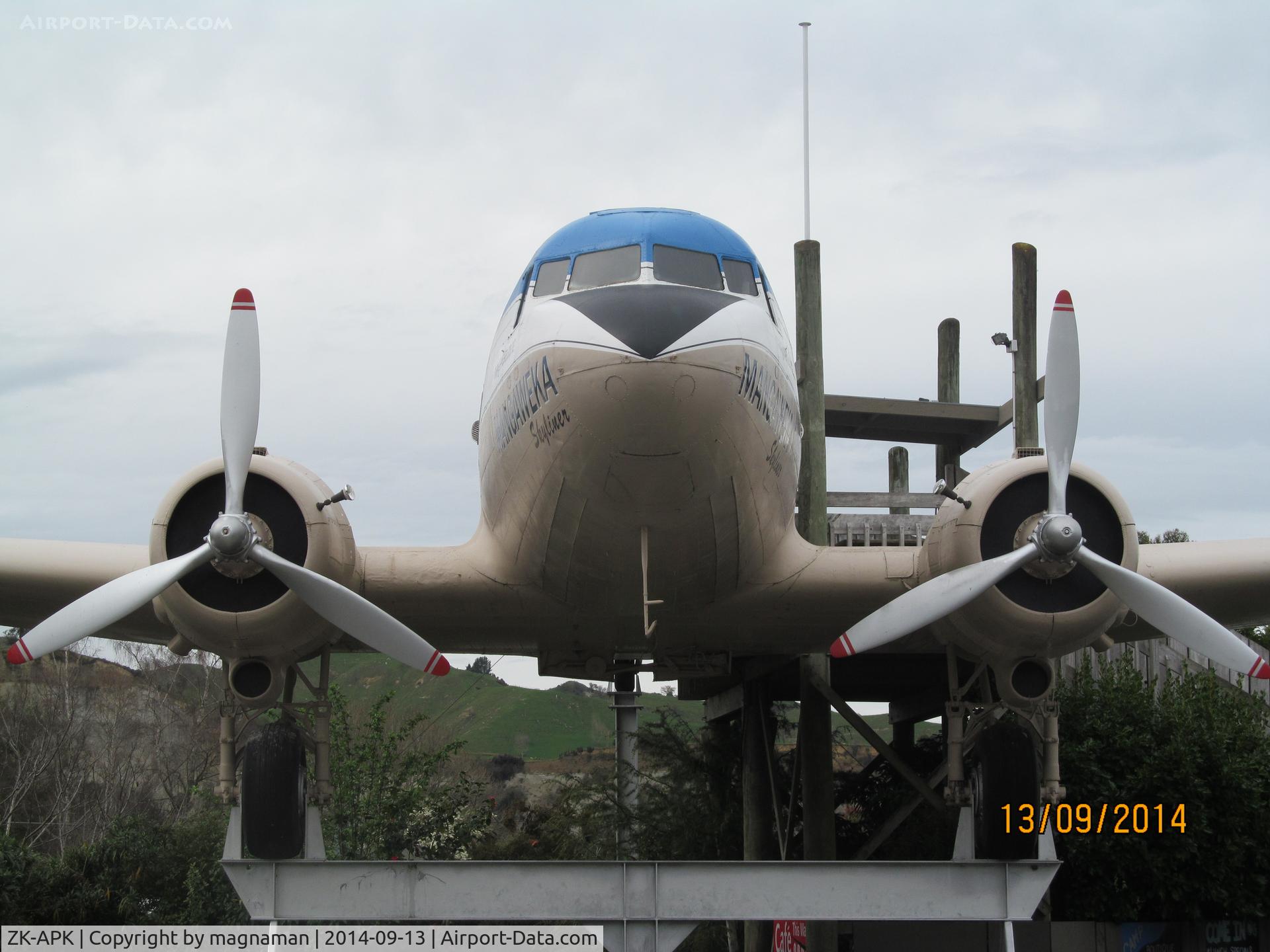ZK-APK, 1945 Douglas C-47B Skytrain C/N 34227, from opposite side of road to café - great coffee