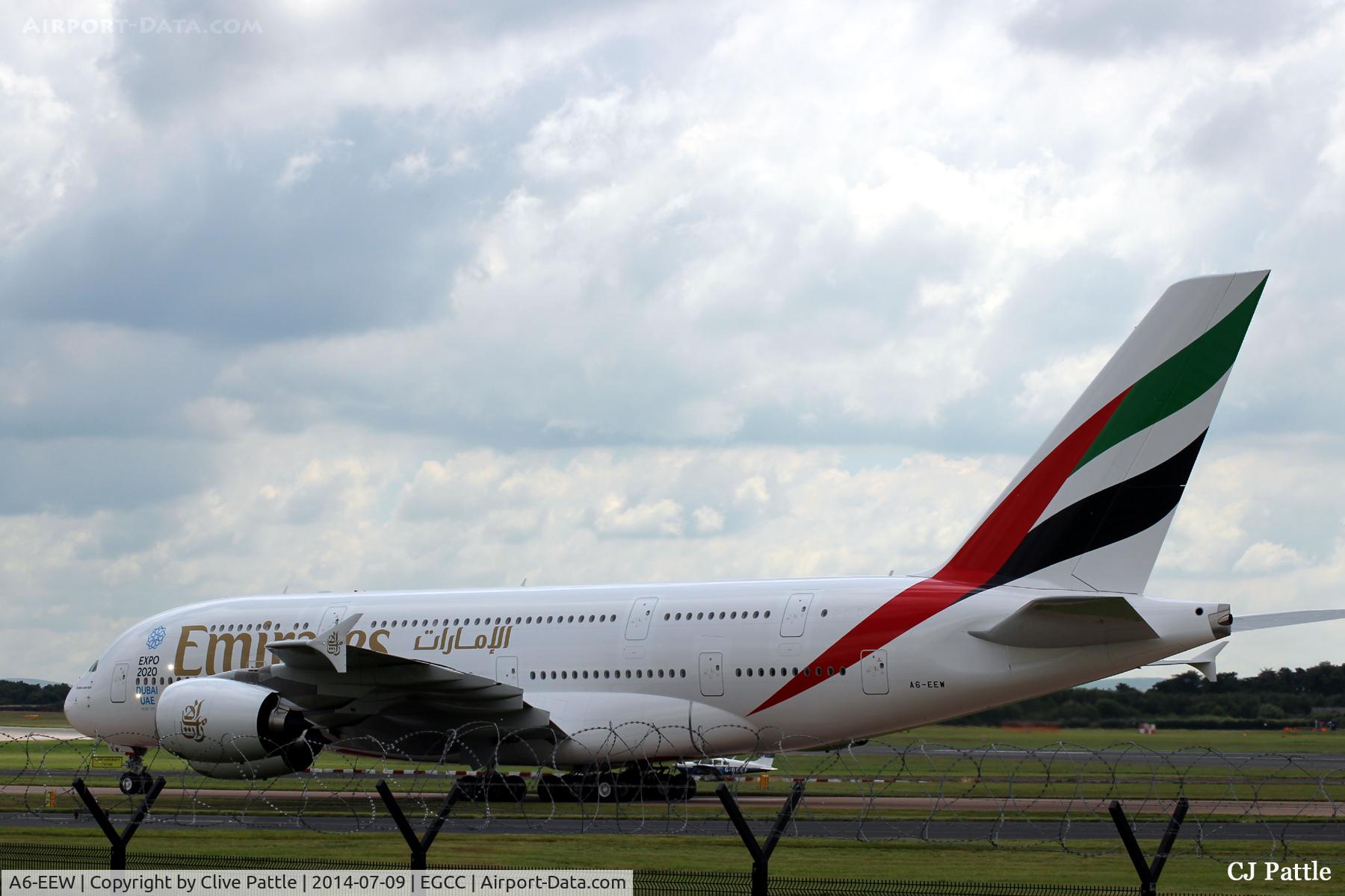 A6-EEW, 2013 Airbus A380-861 C/N 153, Viewed at close quarters passing the viewing enclosure aat Manchester Airport.