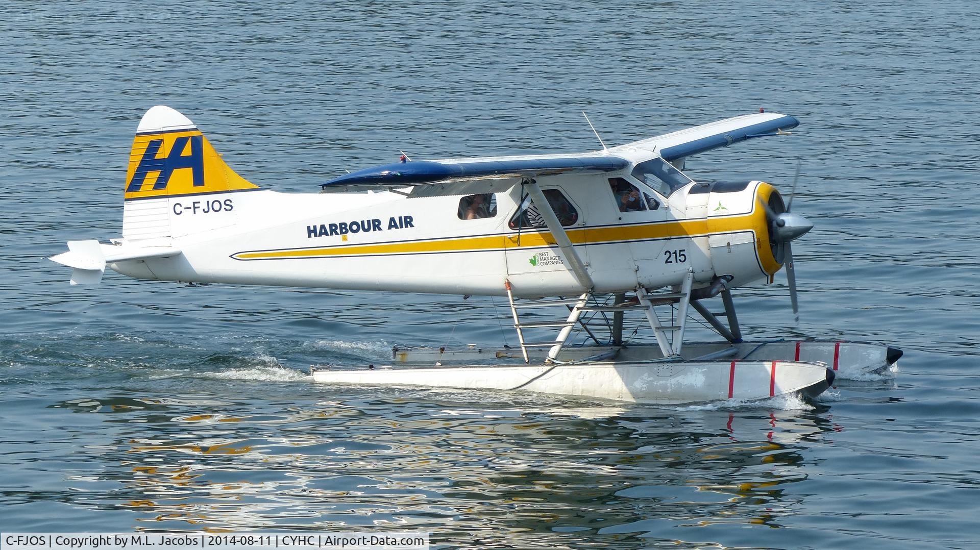 C-FJOS, 1956 De Havilland Canada DHC-2 Beaver Mk.1 C/N 1030, Harbour Air #215 taxiing for takeoff in Coal Harbour.