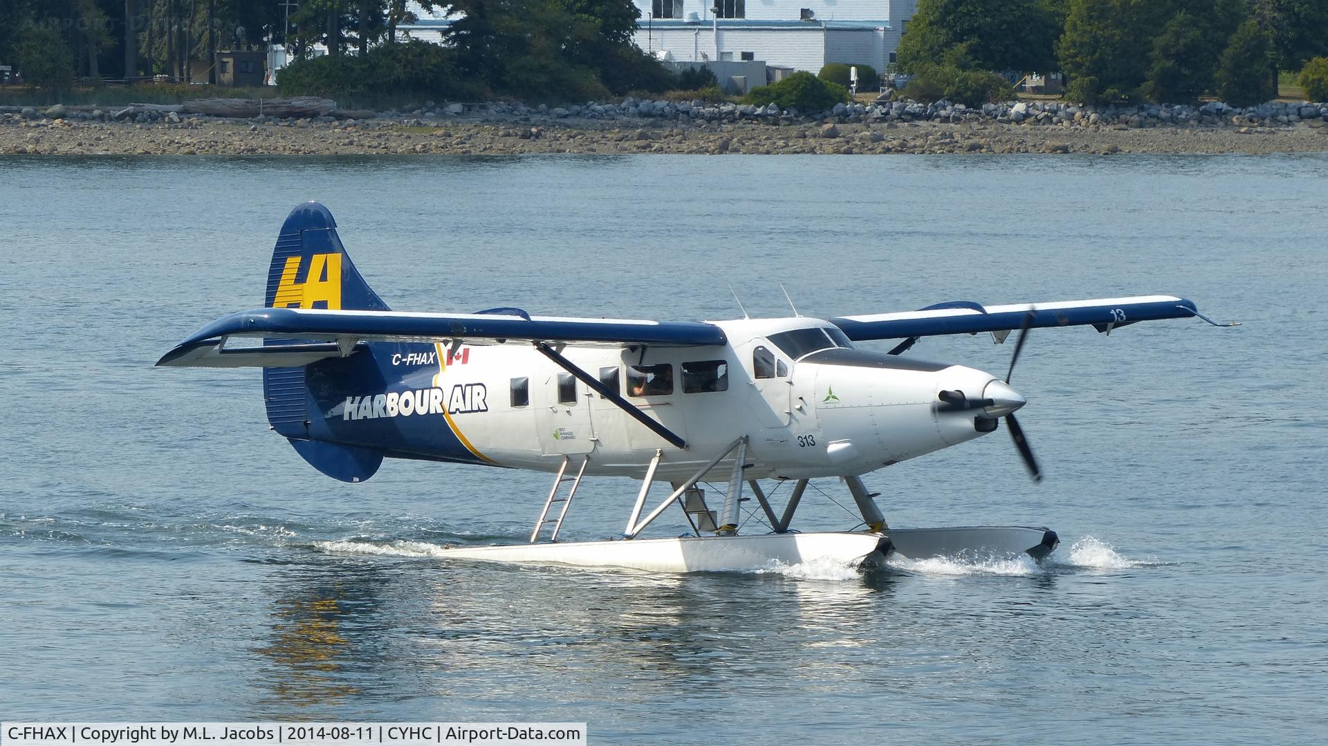 C-FHAX, 1959 De Havilland Canada DHC-3T Vazar Turbine Otter Otter C/N 339, Harbour Air #313 taxiing for takeoff in Coal Harbour.