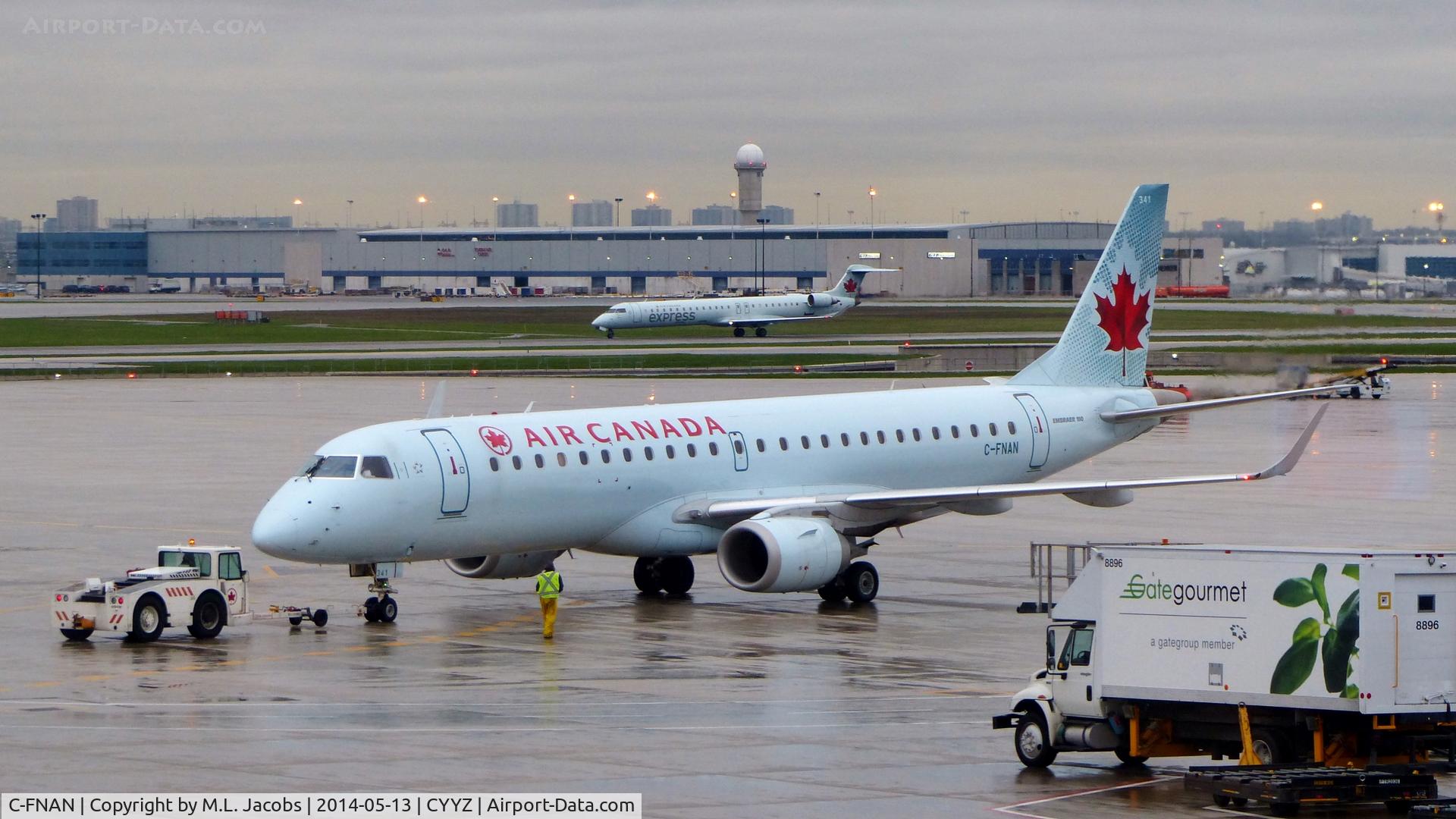 C-FNAN, 2007 Embraer 190AR (ERJ-190-100IGW) C/N 19000136, Air Canada Embraer 190 on a rainy early morning.