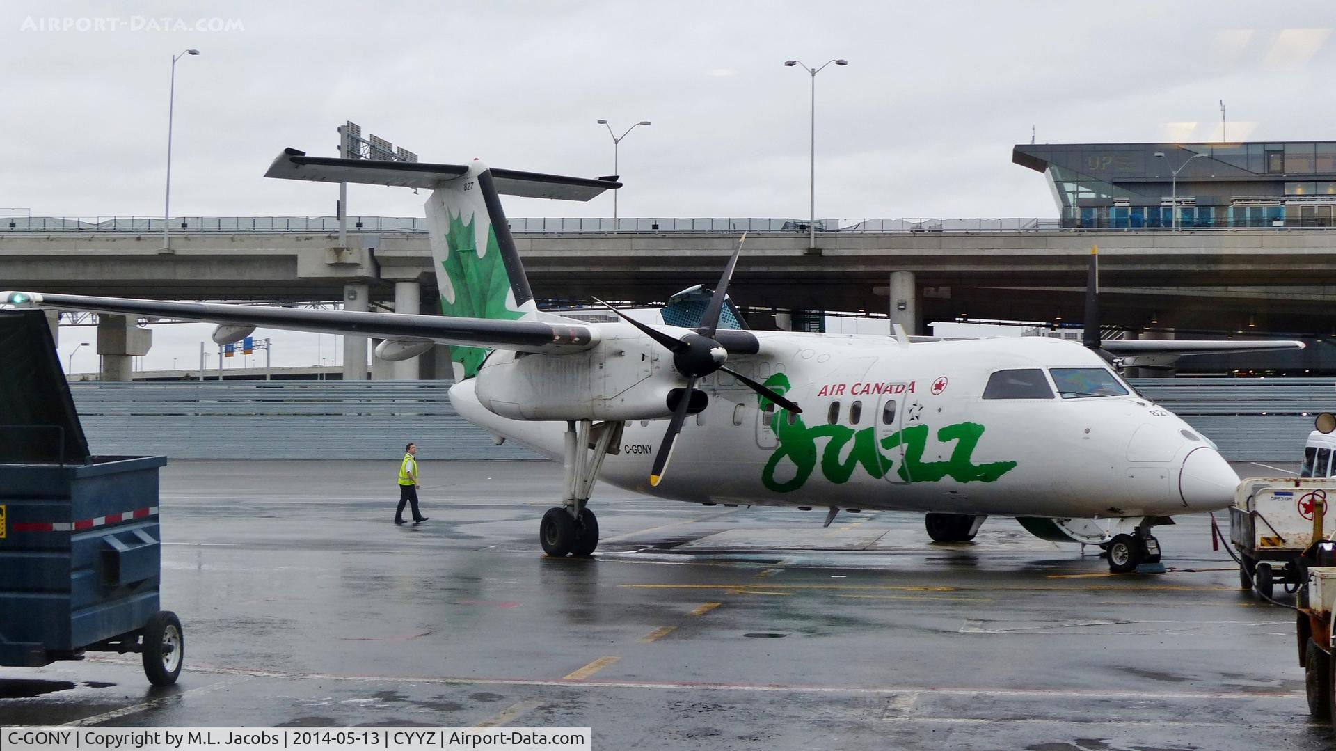 C-GONY, 1988 De Havilland Canada DHC-8-102 Dash 8 C/N 115, Air Canada Jazz Dash 8 on a rainy morning.