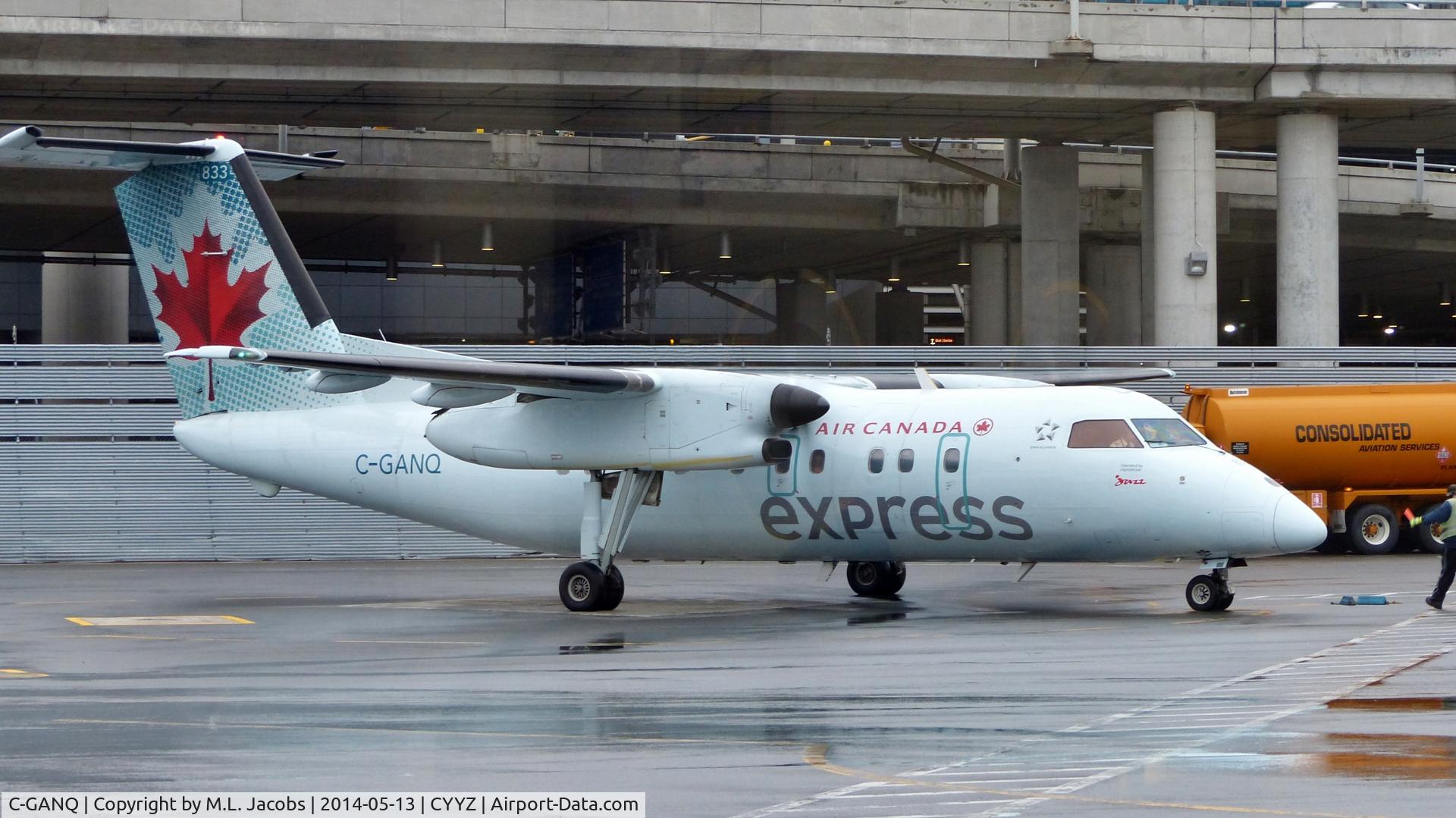 C-GANQ, 1988 De Havilland Canada DHC-8-102 Dash 8 C/N 096, Air Canada Express Dash 8 arriving at the terminal.