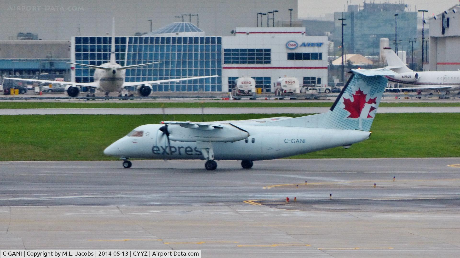 C-GANI, 1986 De Havilland Canada DHC-8-102 Dash 8 C/N 064, Air Canada Express Dash 8 departed terminal.