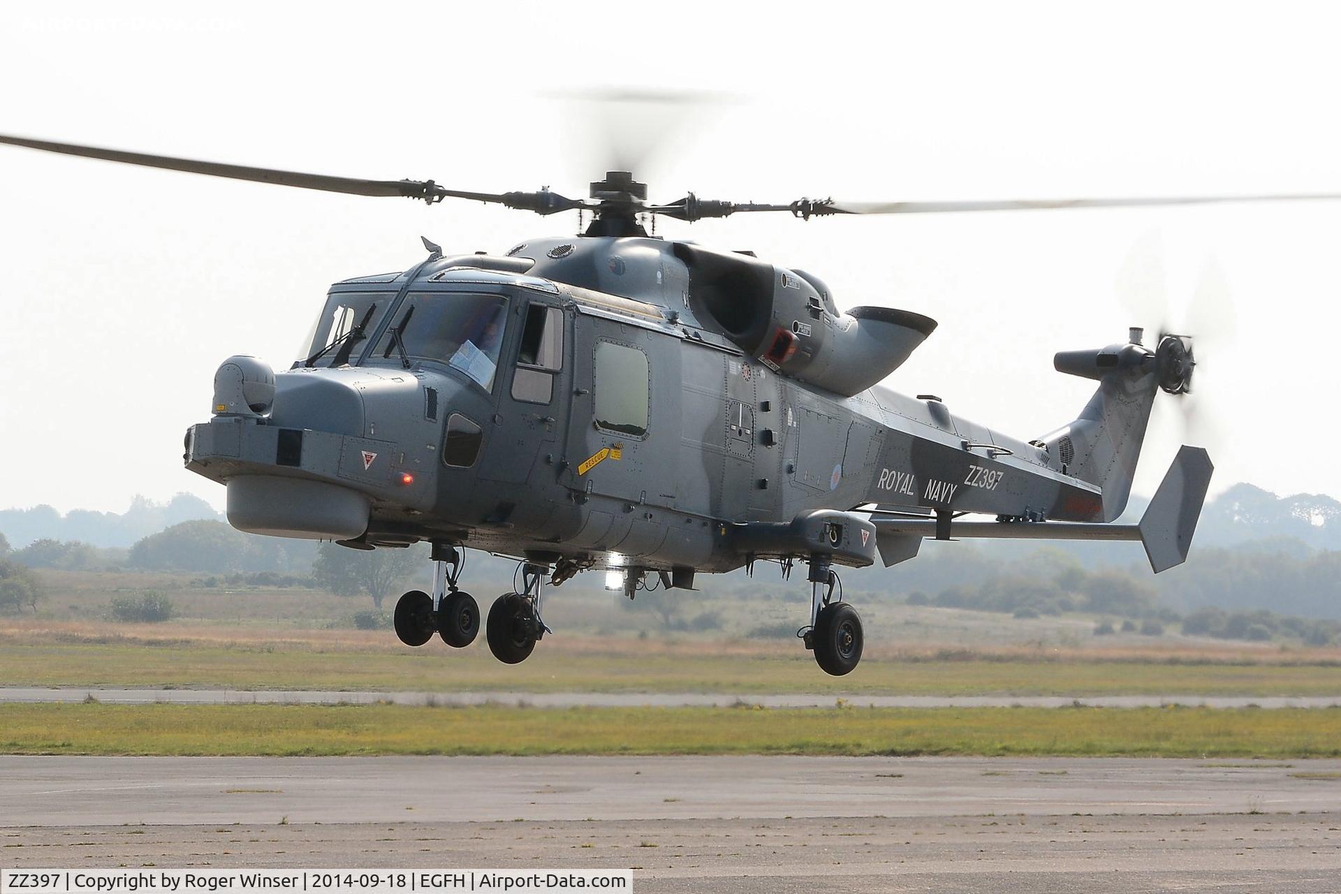 ZZ397, 2013 AgustaWestland AW-159 Wildcat HMA.2 C/N 482, Visiting Navy Wildcat HMA.2 helicopter operated by AgustaWestland, Yeovil arriving at Swansea Airport. Built as the first production Wildcat for the RN but has been retained by the airframe maker.