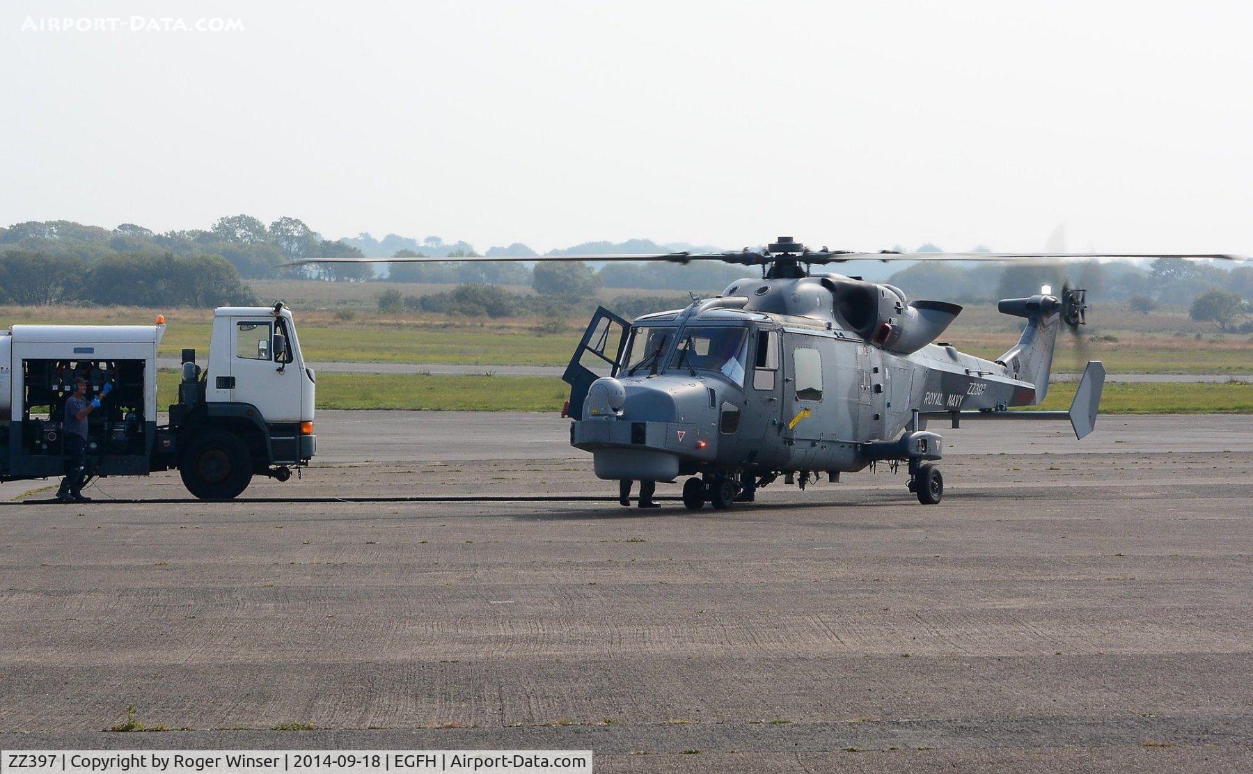 ZZ397, 2013 AgustaWestland AW-159 Wildcat HMA.2 C/N 482, Visiting Navy Wildcat HMA.2 helicopter operated by AgustaWestland, Yeovil taking on fuel at Swansea Airport. 