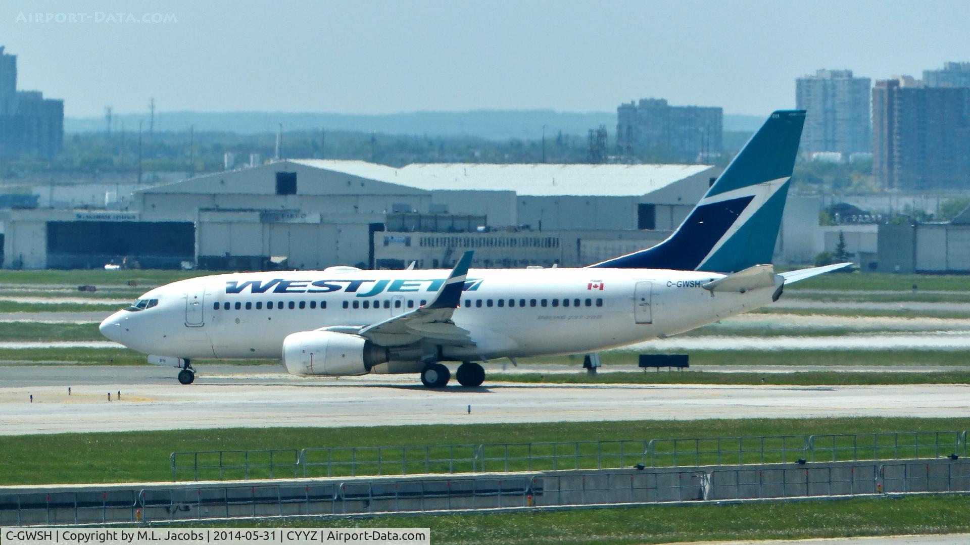 C-GWSH, 2002 Boeing 737-76N C/N 29886, WestJet Boeing 737 taxiing out.