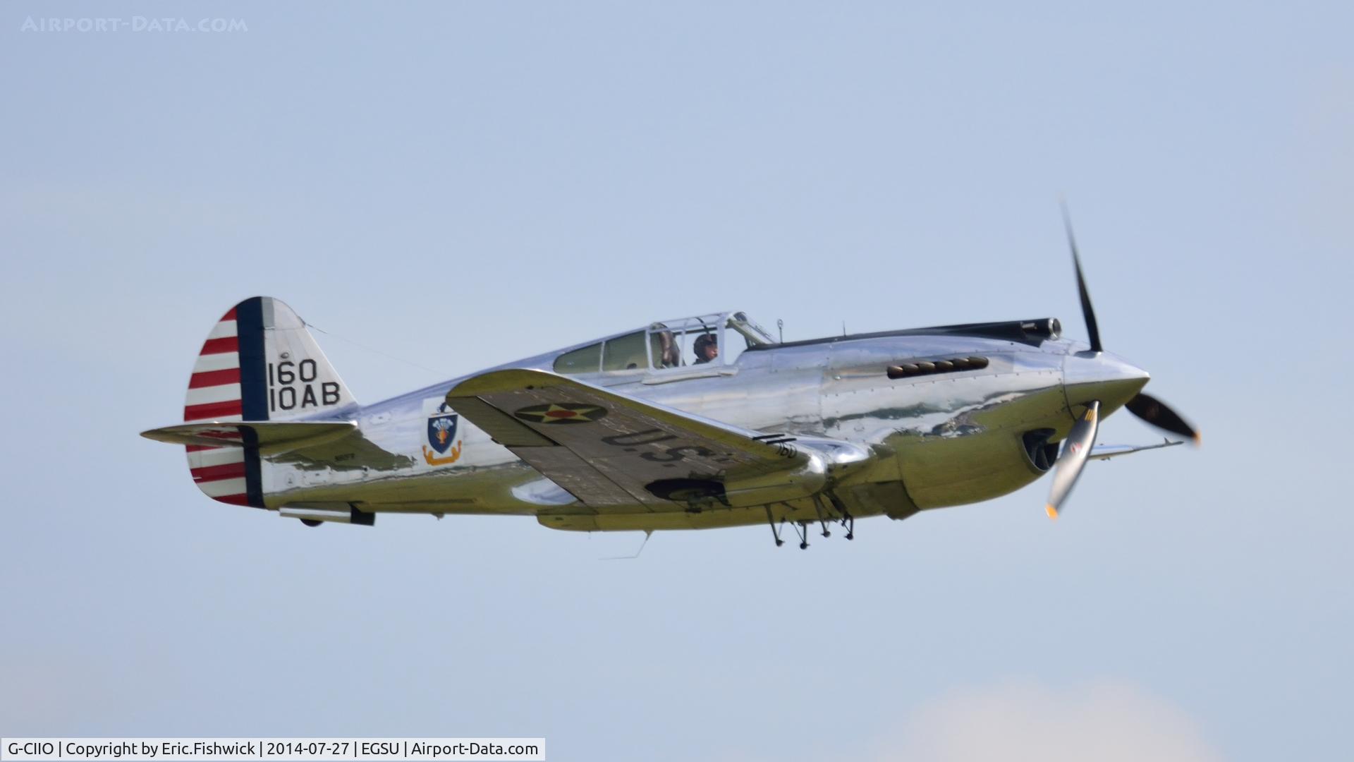 G-CIIO, 1941 Curtiss P-40C Warhawk C/N 16161, 42. G-CIIO iN display mode at The Flying Legends Air Show, IWM Duxford. July,2014.