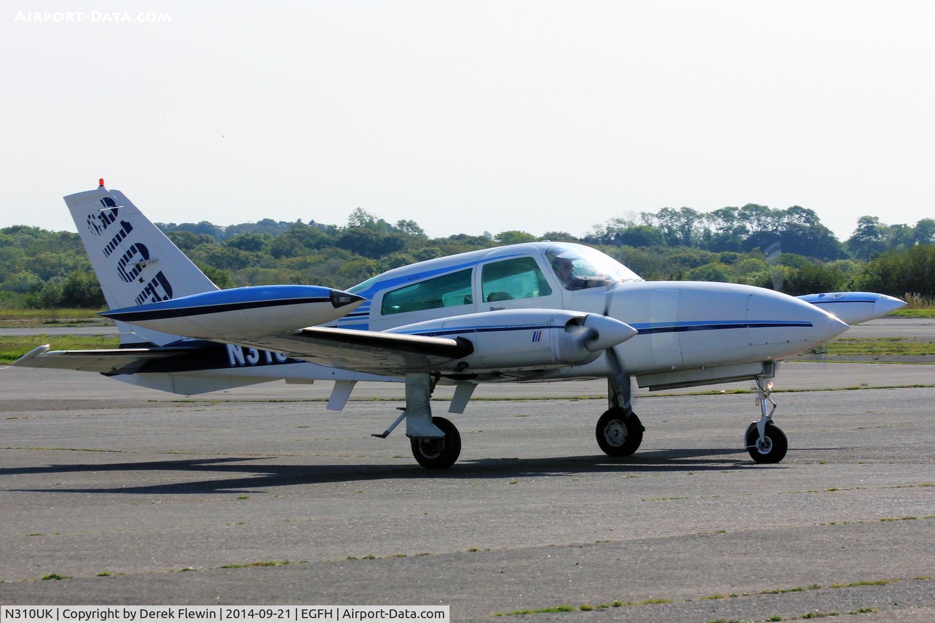 N310UK, 1976 Cessna 310R C/N 310R0584, Visiting Cessna 310R, Haverfordwest based, previously N 87473, HB-LMD, F-GEBB, G-MPBI, seen taxxing at EGFH.