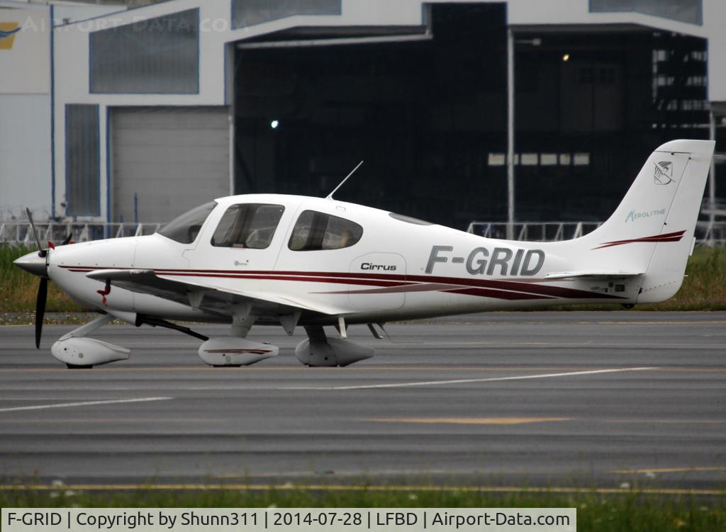 F-GRID, 2005 Cirrus SR20 C/N 1347, Parked at the General Aviation area...