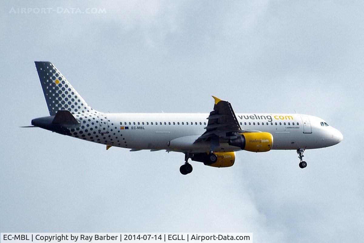 EC-MBL, 2009 Airbus A320-214 C/N 3833, Airbus A320-216 [3833] (Vueling Airlines) Home~G 14/07/2014. On approach 27L.